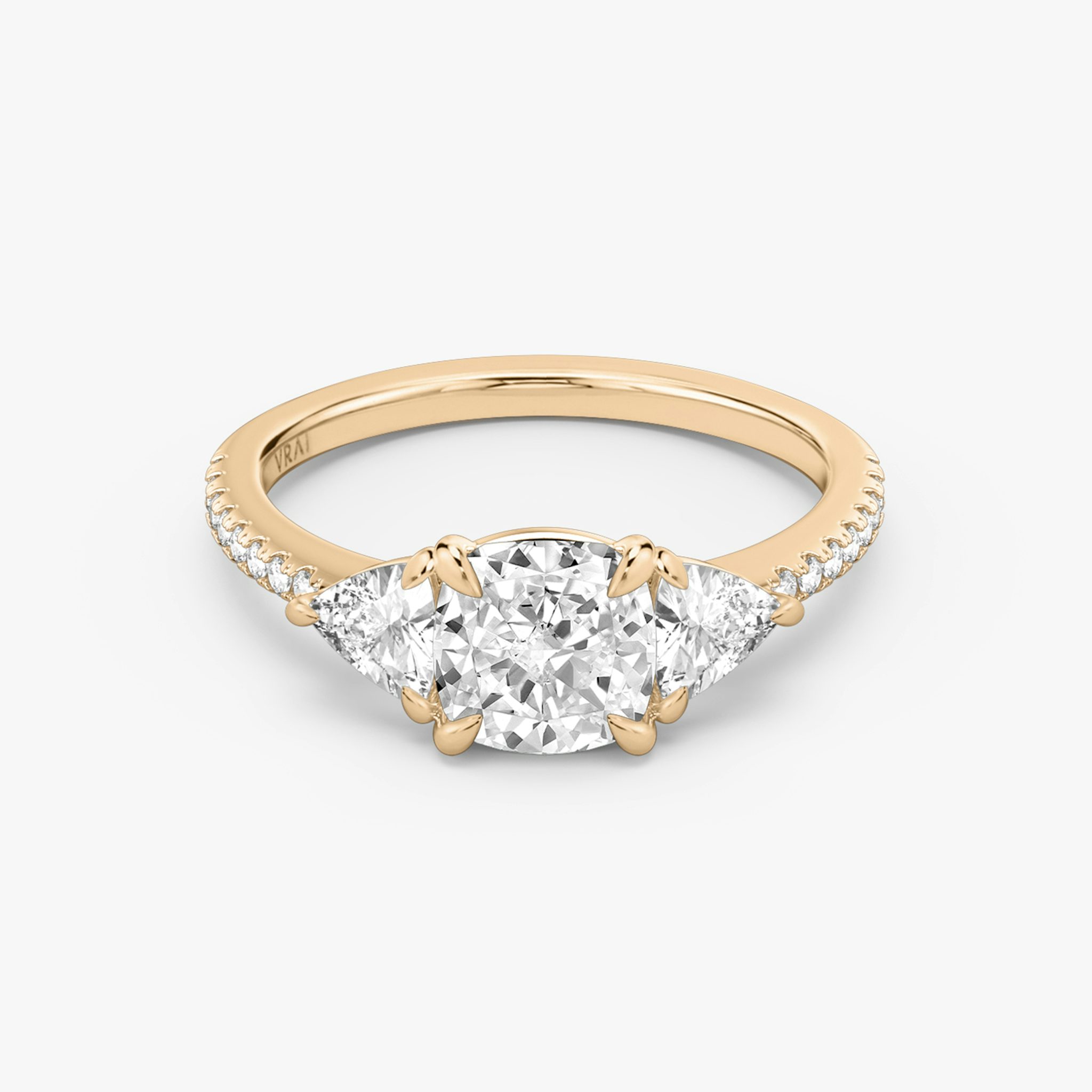 The Three Stone | Cushion | 14k | Rose Gold | bandAccent: Pavé | sideStoneCarat: 0.25ct | sideStoneShape: Trillion | diamondOrientation: vertical | caratWeight: other