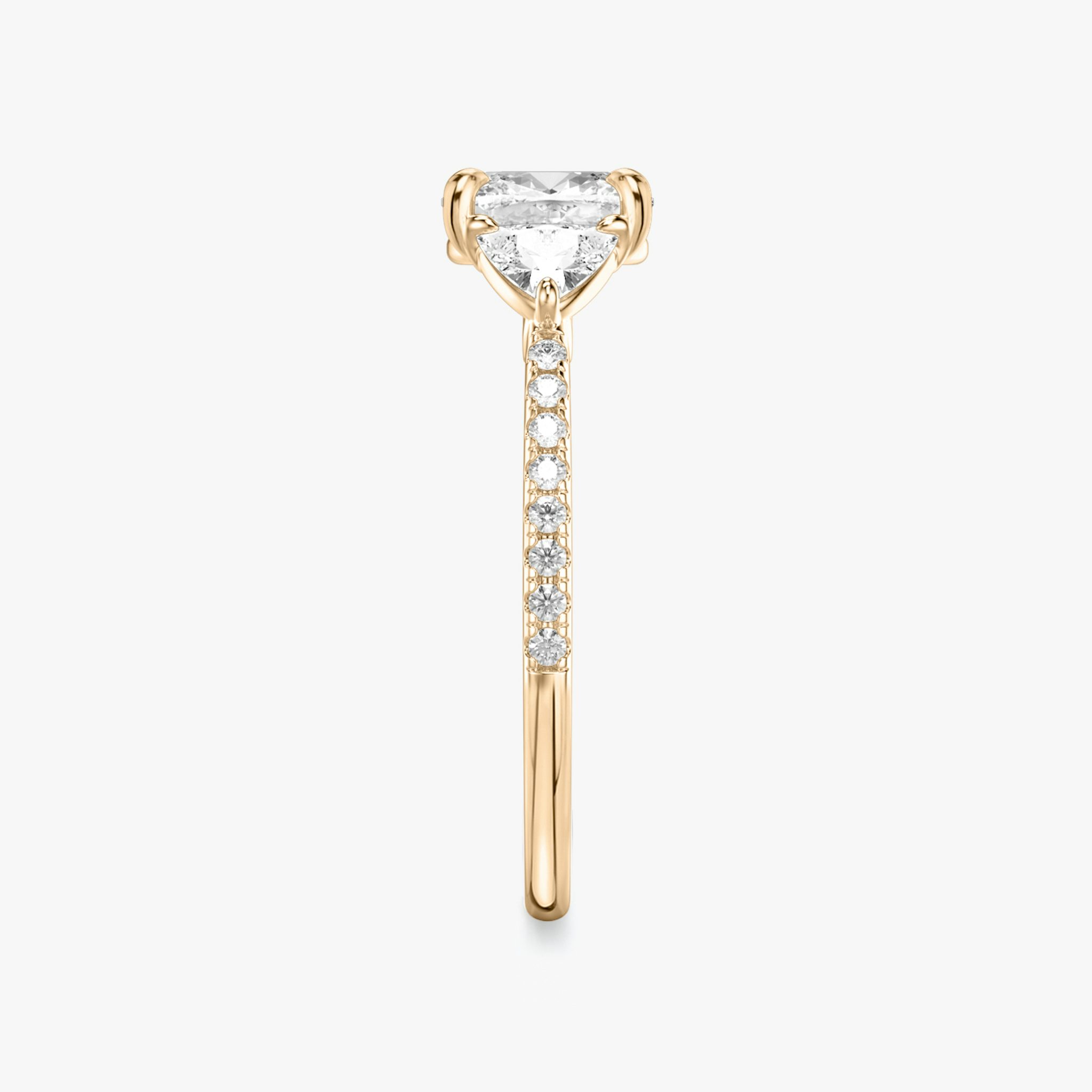 The Three Stone | Cushion | 14k | Rose Gold | bandAccent: Pavé | sideStoneCarat: 0.25ct | sideStoneShape: Trillion | diamondOrientation: vertical | caratWeight: other