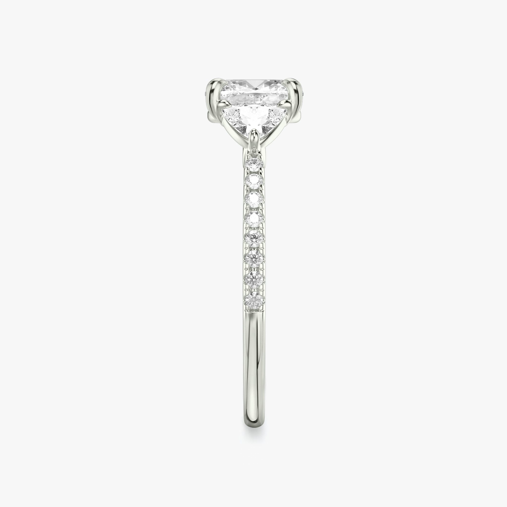 The Three Stone | Cushion | Platinum | bandAccent: Pavé | sideStoneCarat: 0.25ct | sideStoneShape: Trillion | diamondOrientation: vertical | caratWeight: other