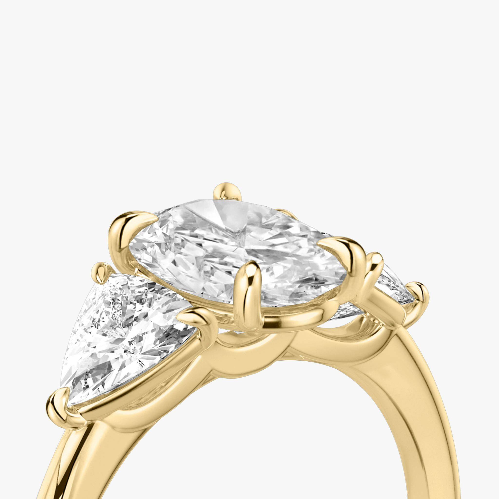 The Three Stone | Oval | 18k | Yellow Gold | bandAccent: Plain | sideStoneCarat: 0.50ct | sideStoneShape: Trillion | diamondOrientation: vertical | caratWeight: other