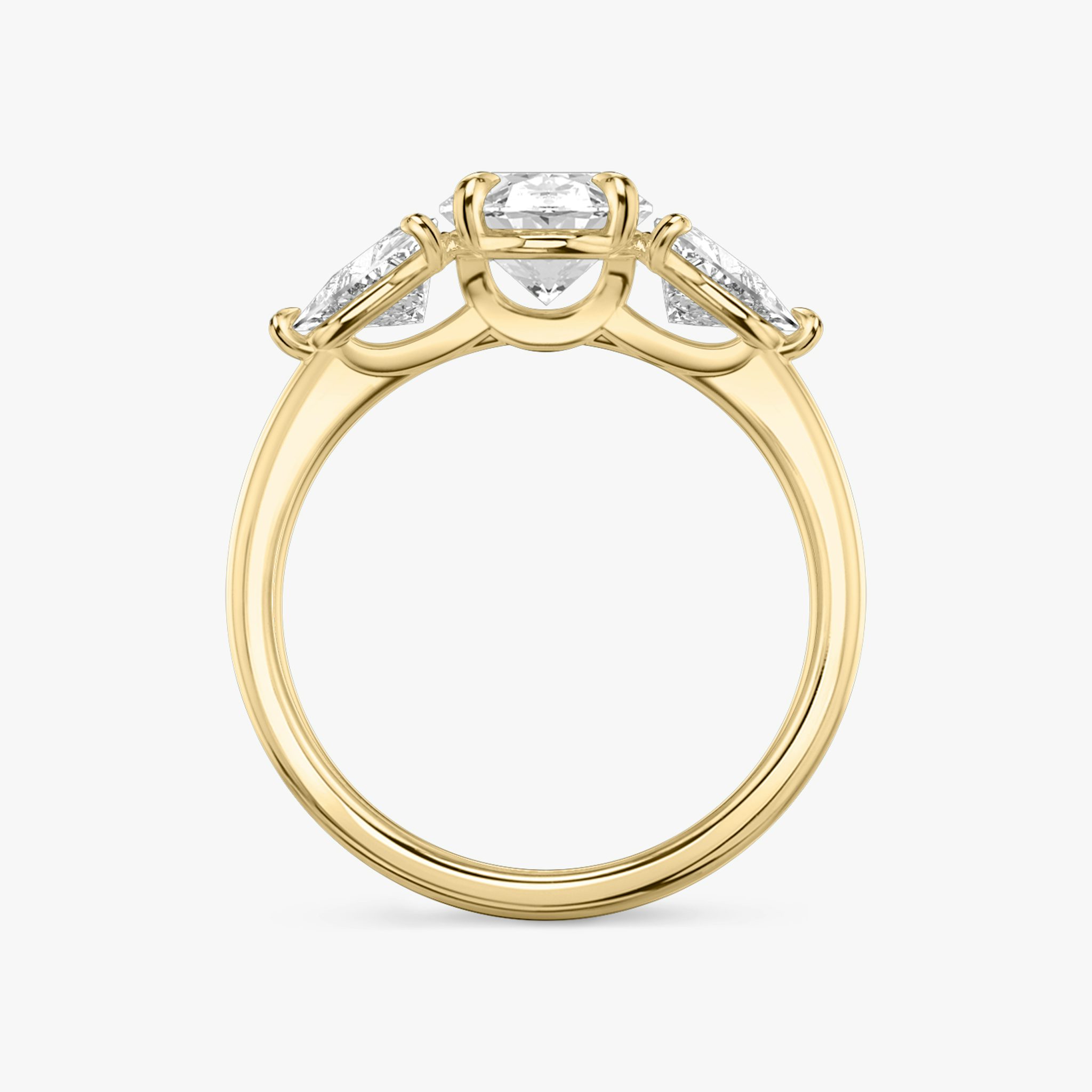 The Three Stone | Oval | 18k | Yellow Gold | bandAccent: Plain | sideStoneCarat: 0.50ct | sideStoneShape: Trillion | diamondOrientation: vertical | caratWeight: other