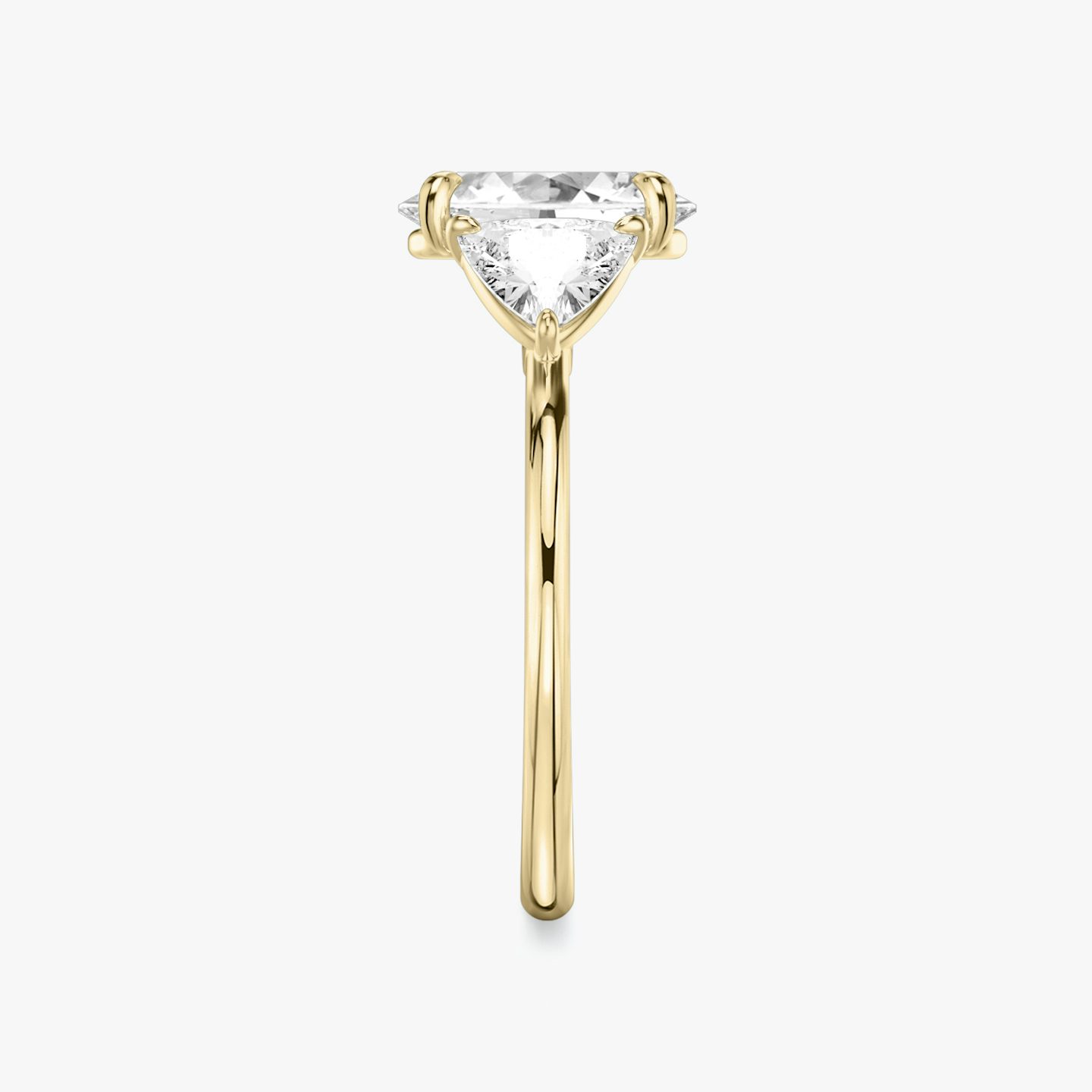 The Three Stone | Oval | 18k | Yellow Gold | bandAccent: Plain | sideStoneCarat: 0.50ct | sideStoneShape: Trillion | diamondOrientation: vertical | caratWeight: other