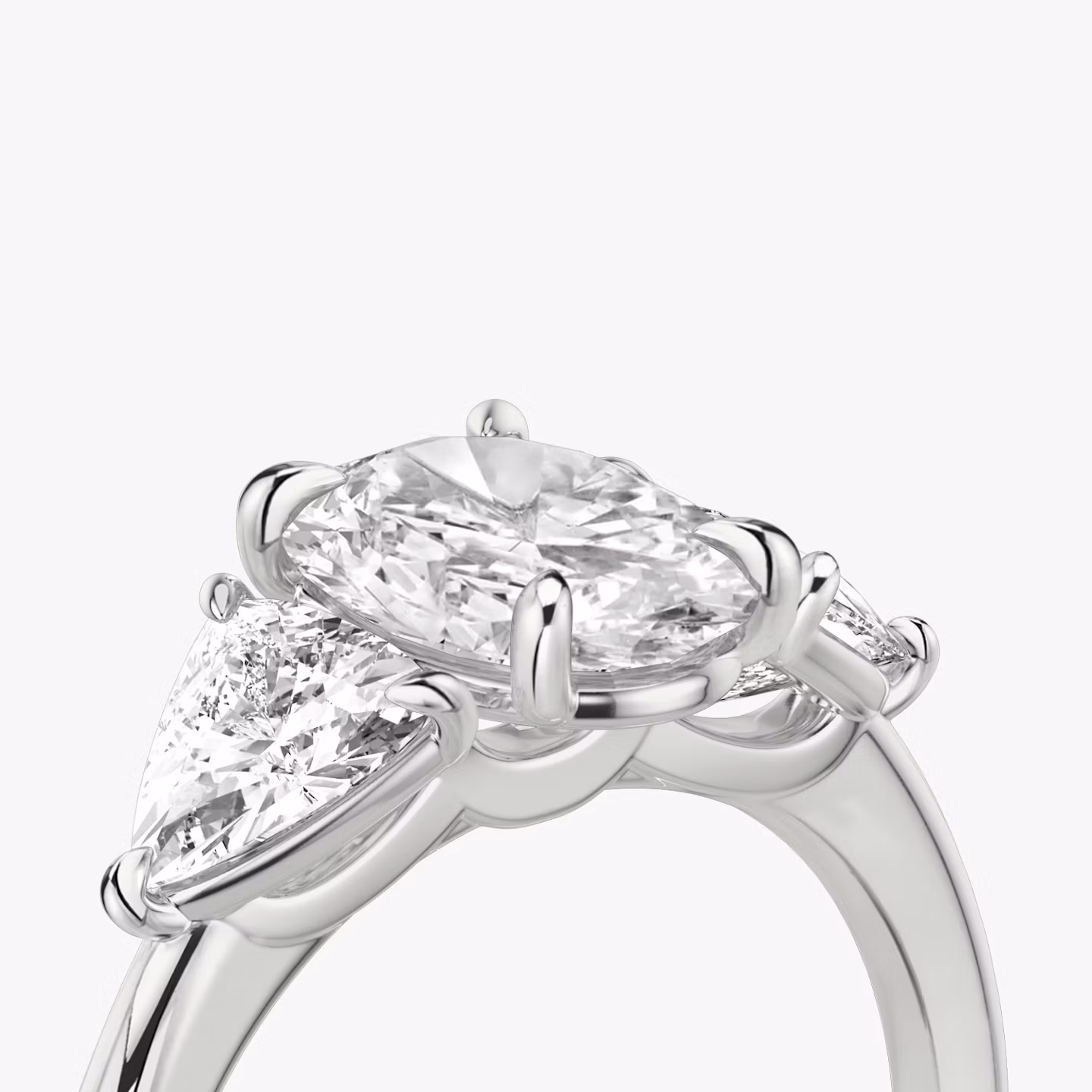 The Three Stone | Oval | 18k | White Gold | bandAccent: Plain | sideStoneCarat: 0.50ct | sideStoneShape: Trillion | diamondOrientation: vertical | caratWeight: other