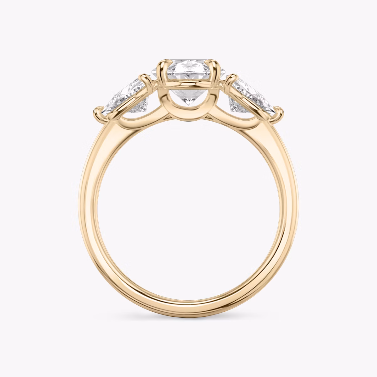 The Three Stone | Oval | 14k | Rose Gold | bandAccent: Plain | sideStoneCarat: 0.50ct | sideStoneShape: Trillion | diamondOrientation: vertical | caratWeight: other