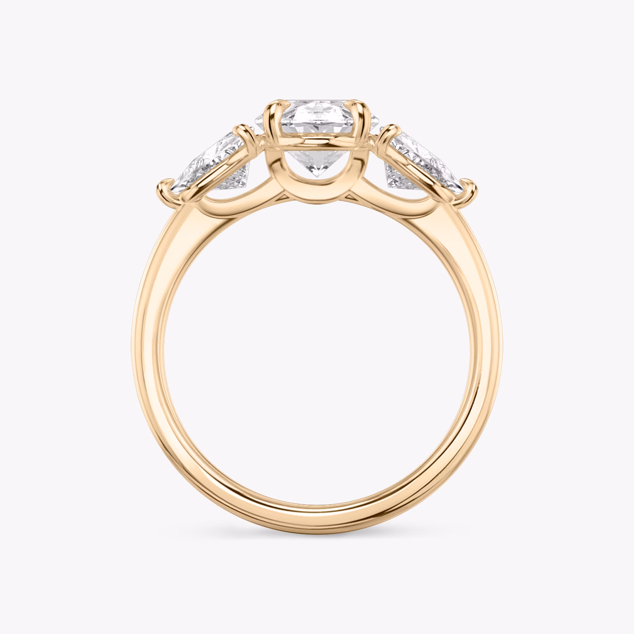 The Three Stone | Oval | 14k | Rose Gold | bandAccent: Plain | sideStoneCarat: 0.50ct | sideStoneShape: Trillion | diamondOrientation: vertical | caratWeight: other