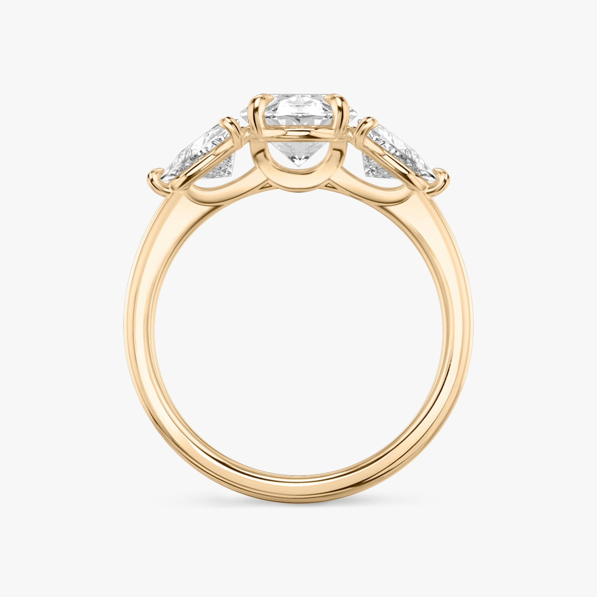 The Three Stone | Oval | 14k | Rose Gold | bandAccent: Plain | sideStoneCarat: 0.50ct | sideStoneShape: Trillion | diamondOrientation: vertical | caratWeight: other