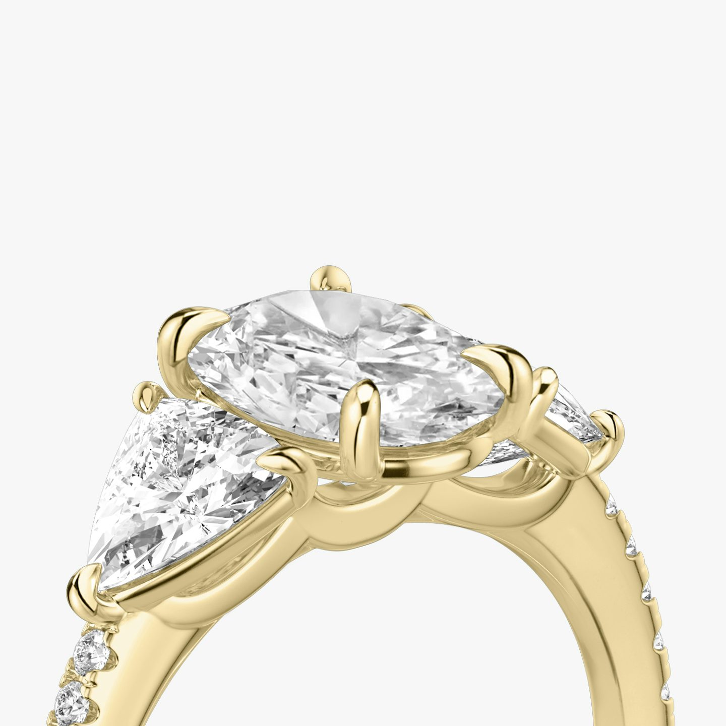 The Three Stone | Oval | 18k | Yellow Gold | bandAccent: Pavé | sideStoneCarat: 0.50ct | sideStoneShape: Trillion | diamondOrientation: vertical | caratWeight: other
