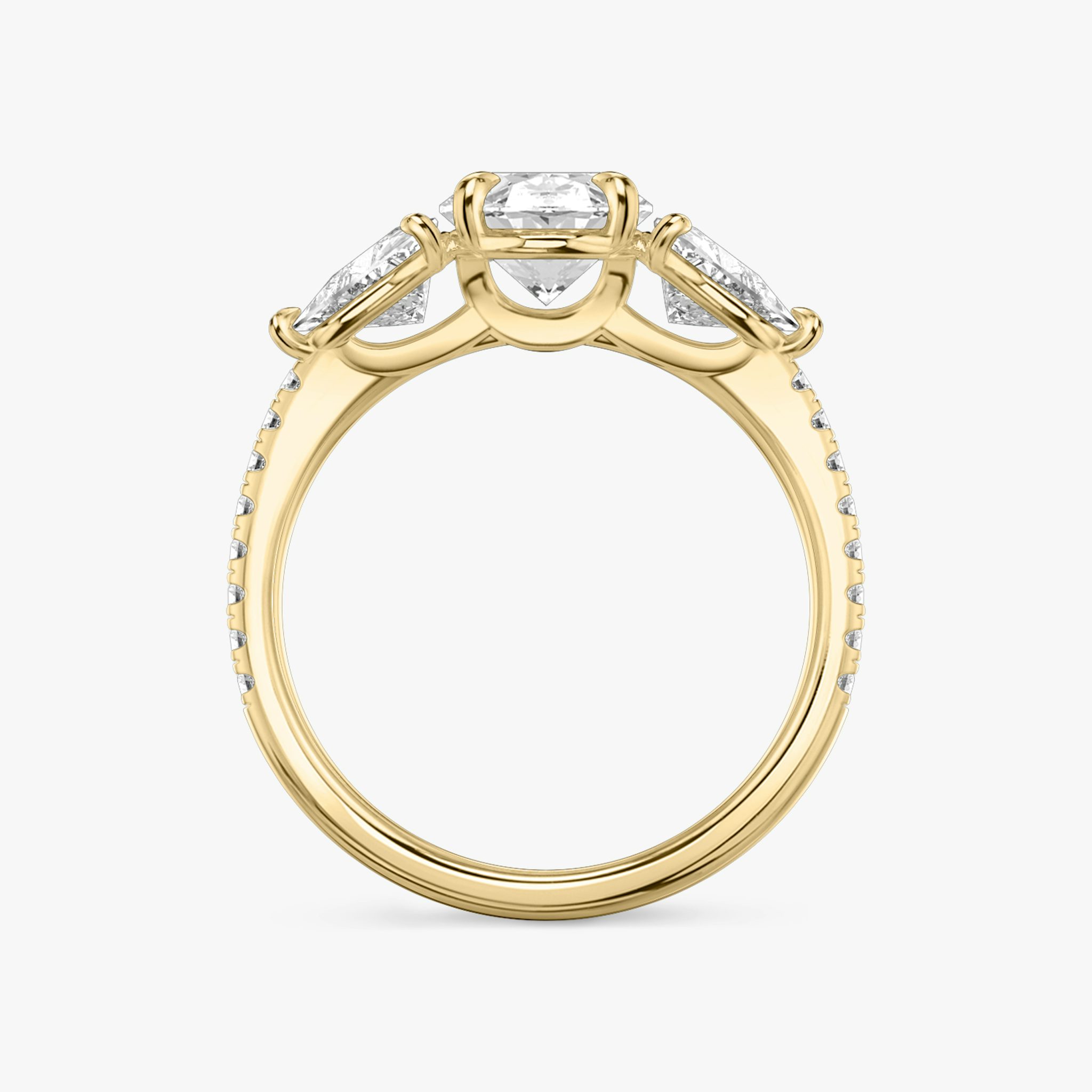 The Three Stone | Oval | 18k | Yellow Gold | bandAccent: Pavé | sideStoneCarat: 0.50ct | sideStoneShape: Trillion | diamondOrientation: vertical | caratWeight: other
