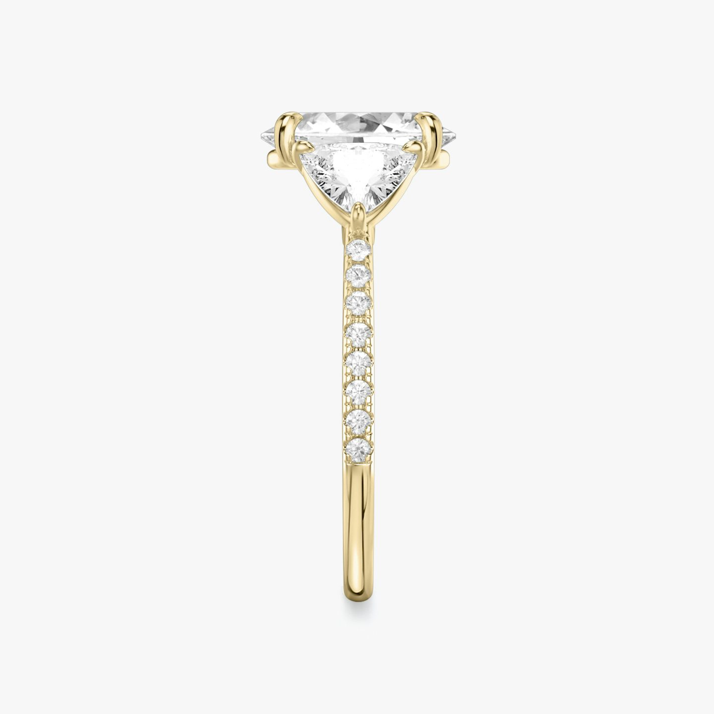 The Three Stone | Oval | 18k | Yellow Gold | bandAccent: Pavé | sideStoneCarat: 0.50ct | sideStoneShape: Trillion | diamondOrientation: vertical | caratWeight: other