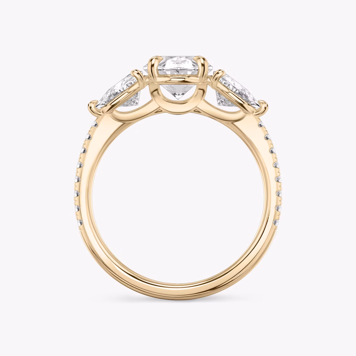 The Three Stone | Oval | 14k | Rose Gold | bandAccent: Pavé | sideStoneCarat: 0.50ct | sideStoneShape: Trillion | diamondOrientation: vertical | caratWeight: other
