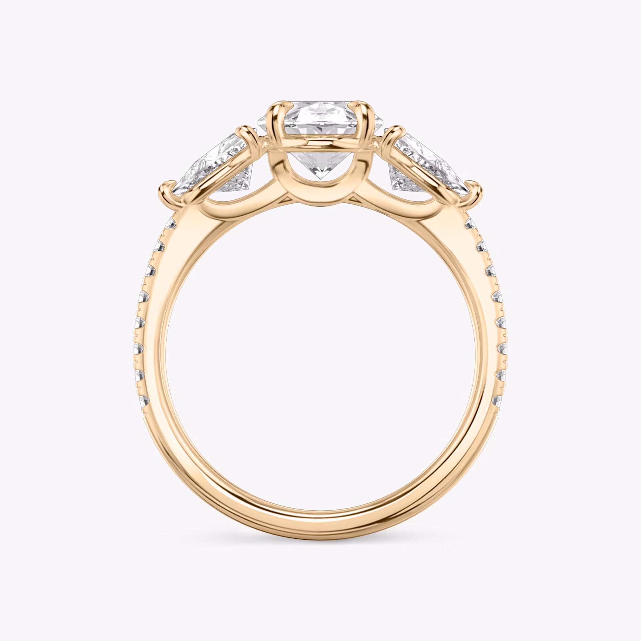 The Three Stone | Oval | 14k | Rose Gold | bandAccent: Pavé | sideStoneCarat: 0.50ct | sideStoneShape: Trillion | diamondOrientation: vertical | caratWeight: other