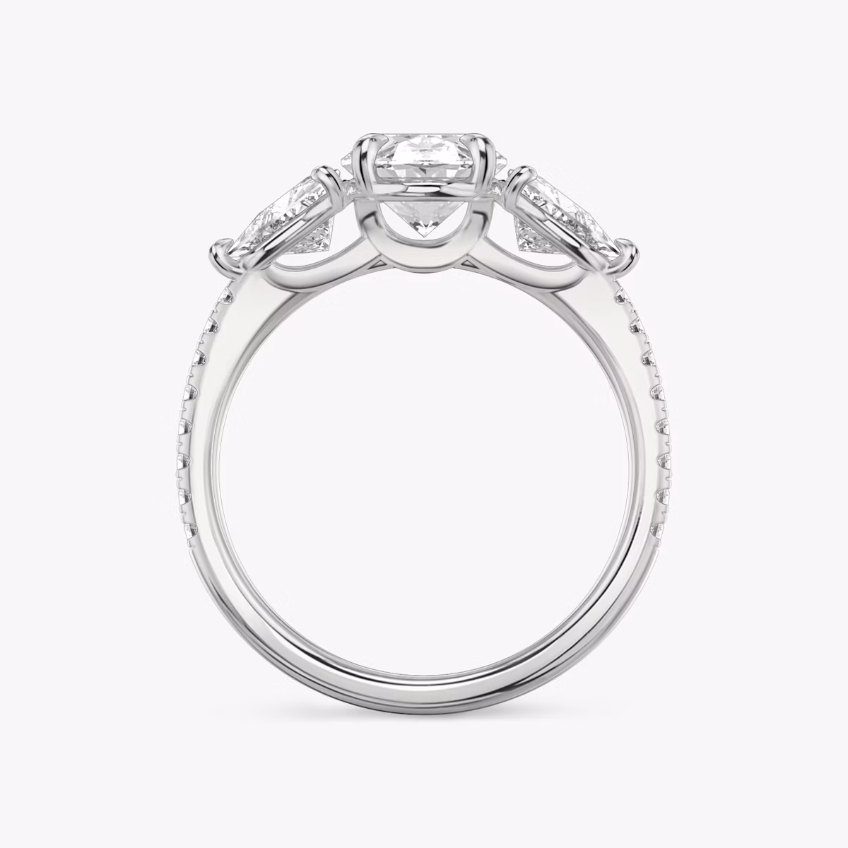 The Three Stone | Oval | Platinum | bandAccent: Pavé | sideStoneCarat: 0.50ct | sideStoneShape: Trillion | diamondOrientation: vertical | caratWeight: other
