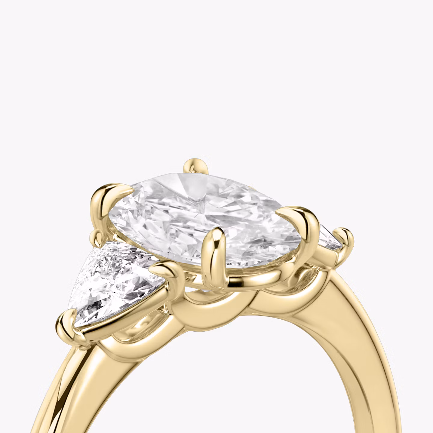 The Three Stone | Oval | 18k | Yellow Gold | bandAccent: Plain | sideStoneCarat: 0.25ct | sideStoneShape: Trillion | diamondOrientation: vertical | caratWeight: other
