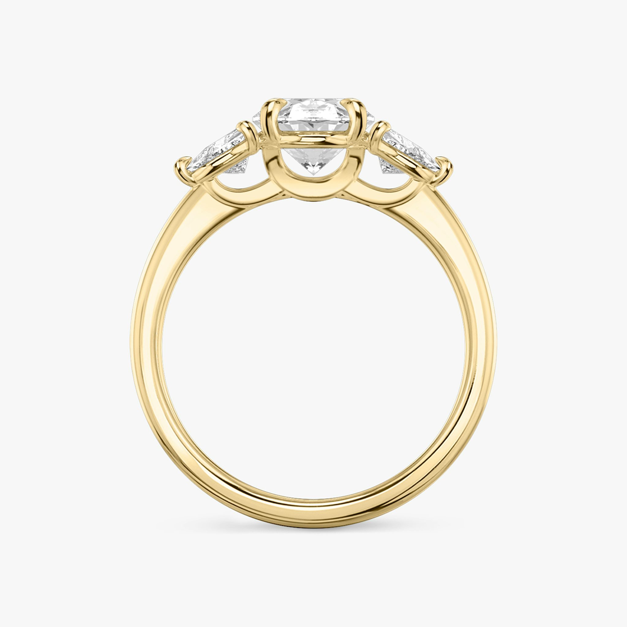 The Three Stone | Oval | 18k | Yellow Gold | bandAccent: Plain | sideStoneCarat: 0.25ct | sideStoneShape: Trillion | diamondOrientation: vertical | caratWeight: other