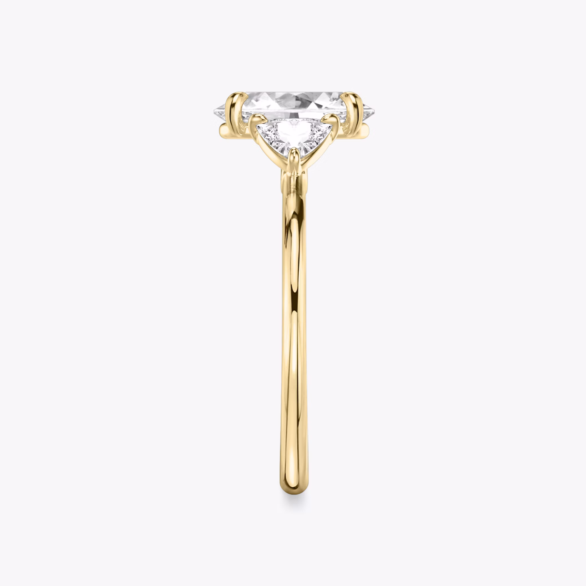 The Three Stone | Oval | 18k | Yellow Gold | bandAccent: Plain | sideStoneCarat: 0.25ct | sideStoneShape: Trillion | diamondOrientation: vertical | caratWeight: other