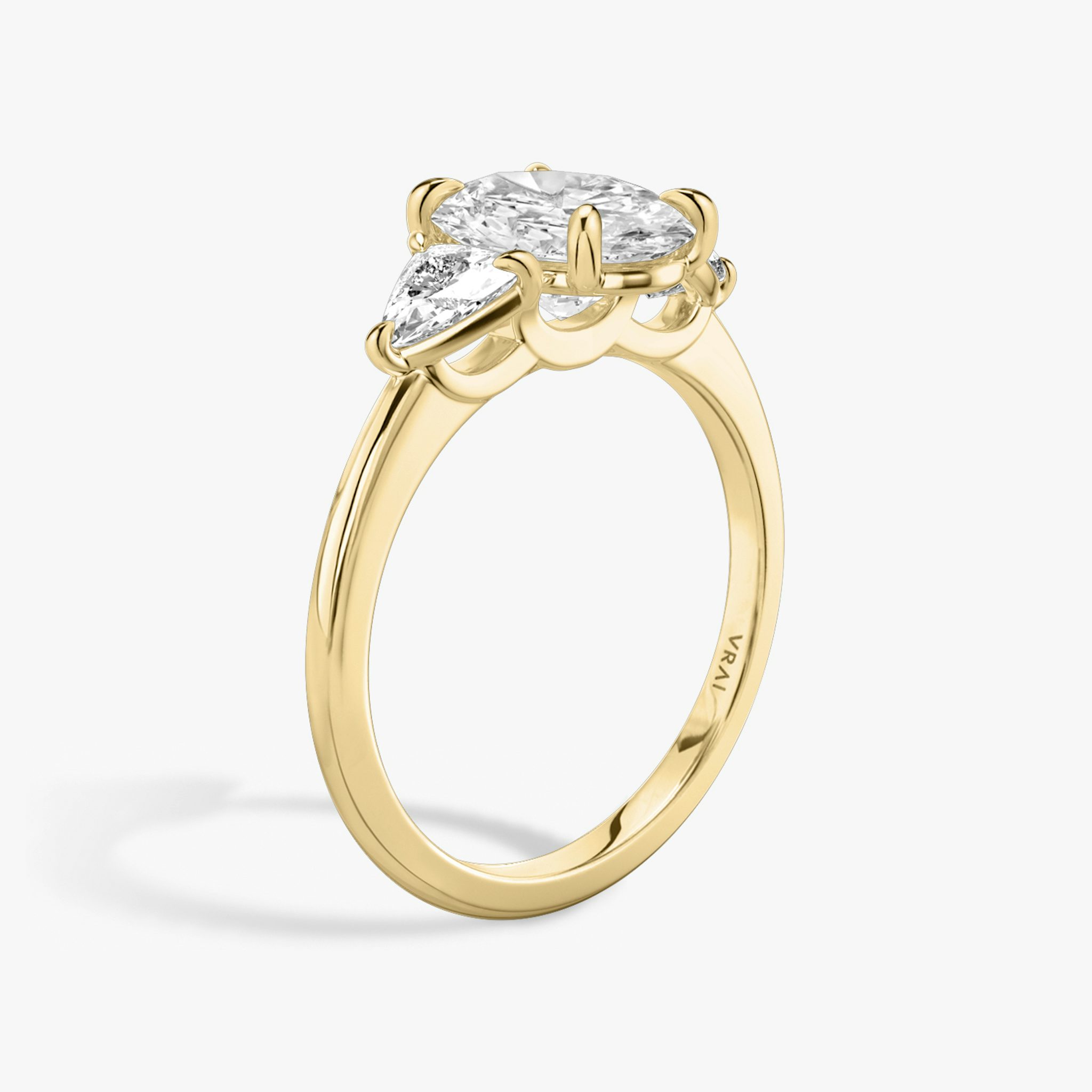The Three Stone | Oval | 18k | Yellow Gold | bandAccent: Plain | sideStoneCarat: 0.25ct | sideStoneShape: Trillion | diamondOrientation: vertical | caratWeight: other