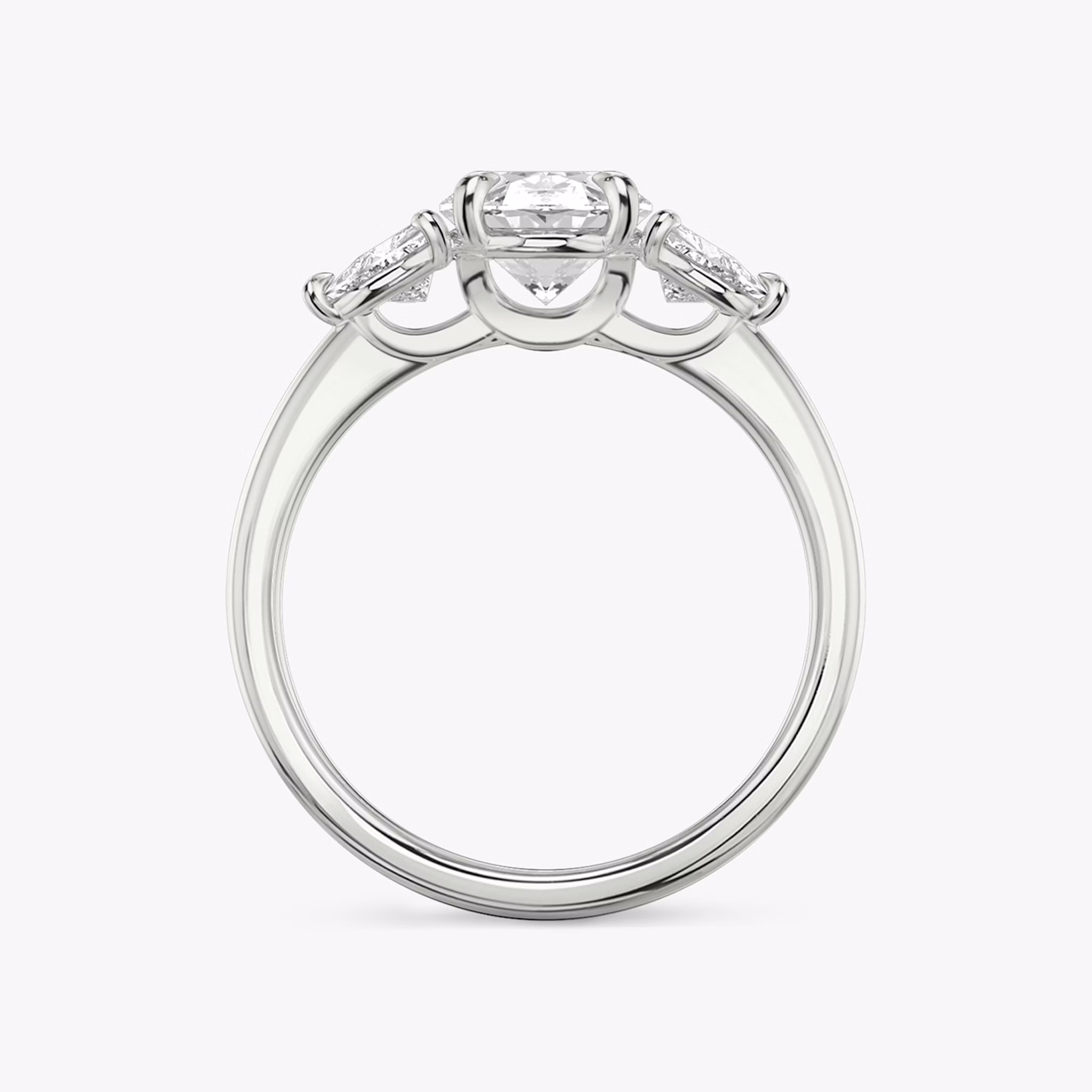 The Three Stone | Oval | 18k | White Gold | bandAccent: Plain | sideStoneCarat: 0.25ct | sideStoneShape: Trillion | diamondOrientation: vertical | caratWeight: other
