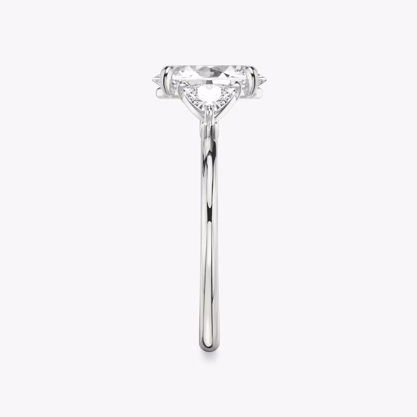 The Three Stone | Oval | 18k | White Gold | bandAccent: Plain | sideStoneCarat: 0.25ct | sideStoneShape: Trillion | diamondOrientation: vertical | caratWeight: other