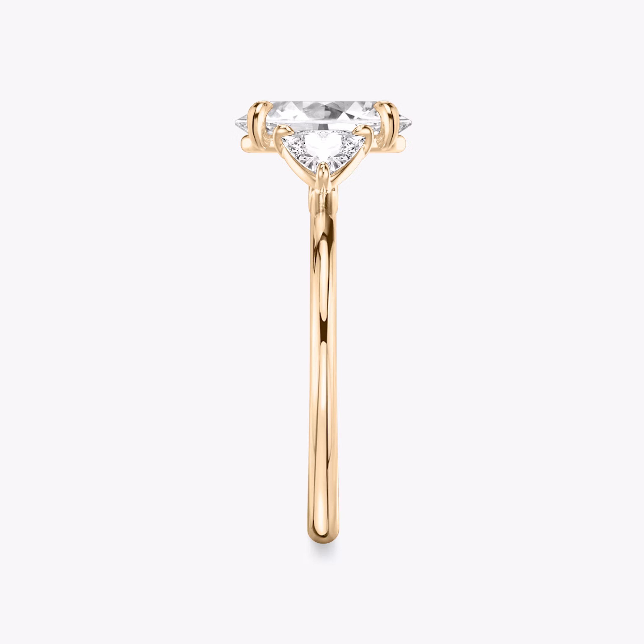 The Three Stone | Oval | 14k | Rose Gold | bandAccent: Plain | sideStoneCarat: 0.25ct | sideStoneShape: Trillion | diamondOrientation: vertical | caratWeight: other