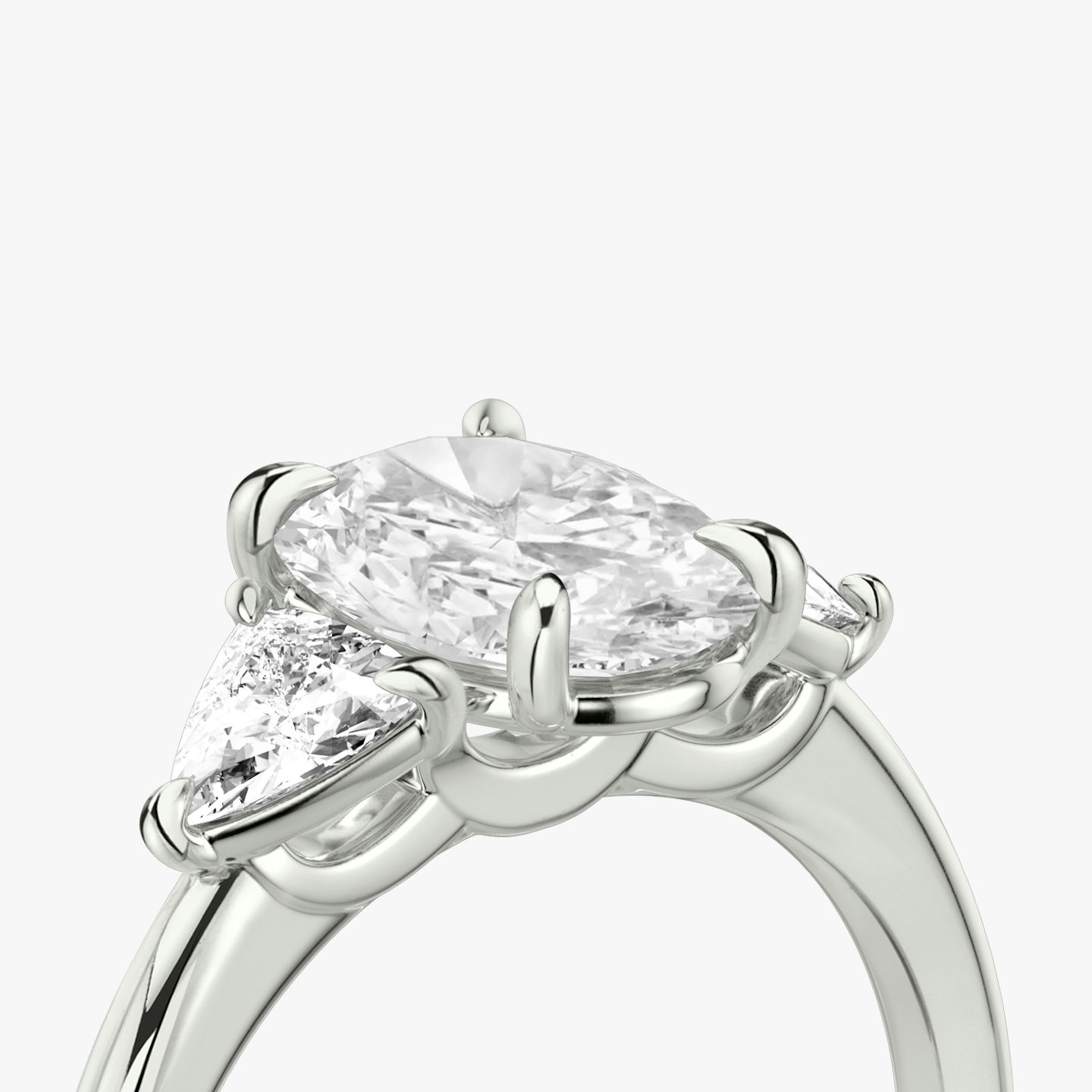 The Three Stone | Oval | Platinum | bandAccent: Plain | sideStoneCarat: 0.25ct | sideStoneShape: Trillion | diamondOrientation: vertical | caratWeight: other