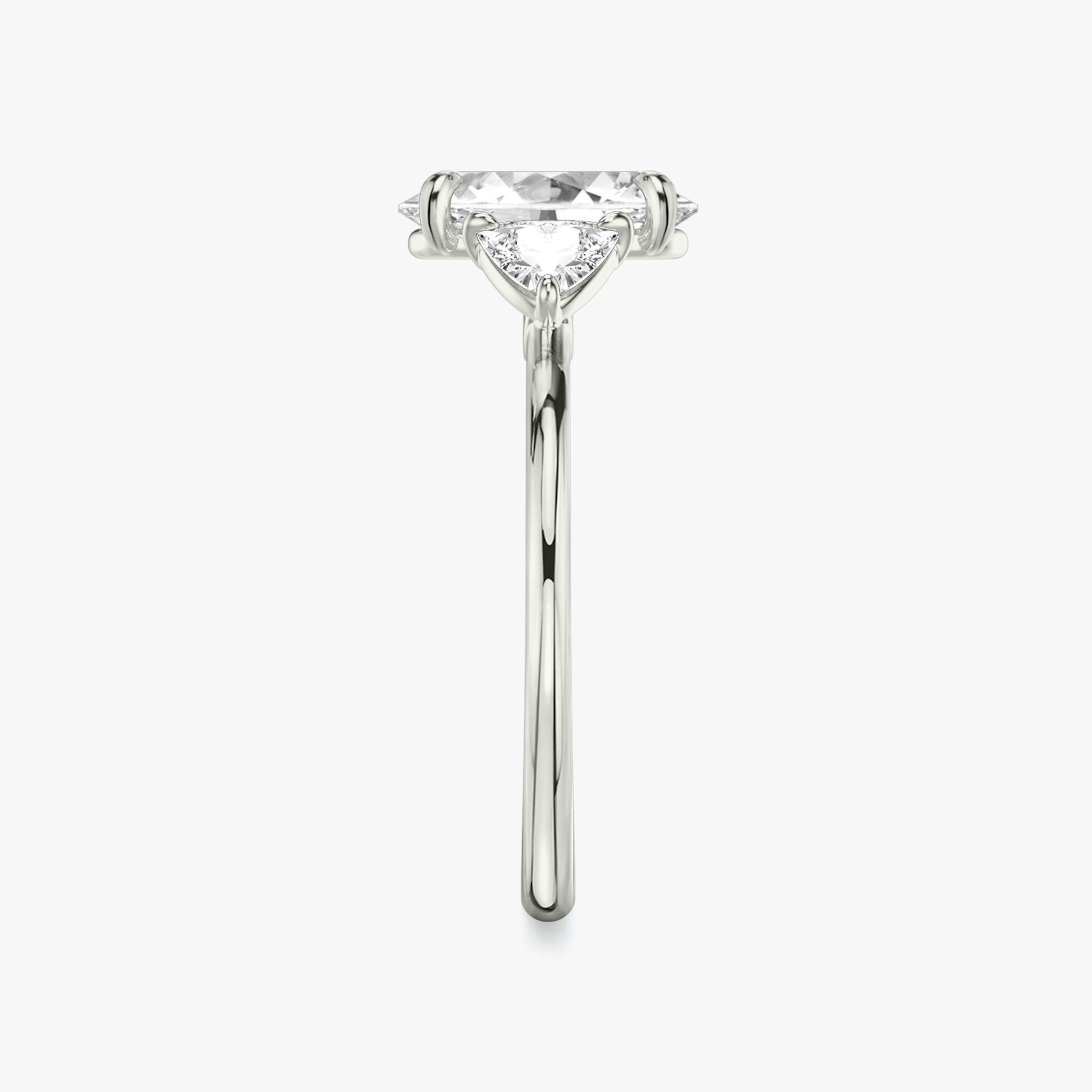 The Three Stone | Oval | Platinum | bandAccent: Plain | sideStoneCarat: 0.25ct | sideStoneShape: Trillion | diamondOrientation: vertical | caratWeight: other