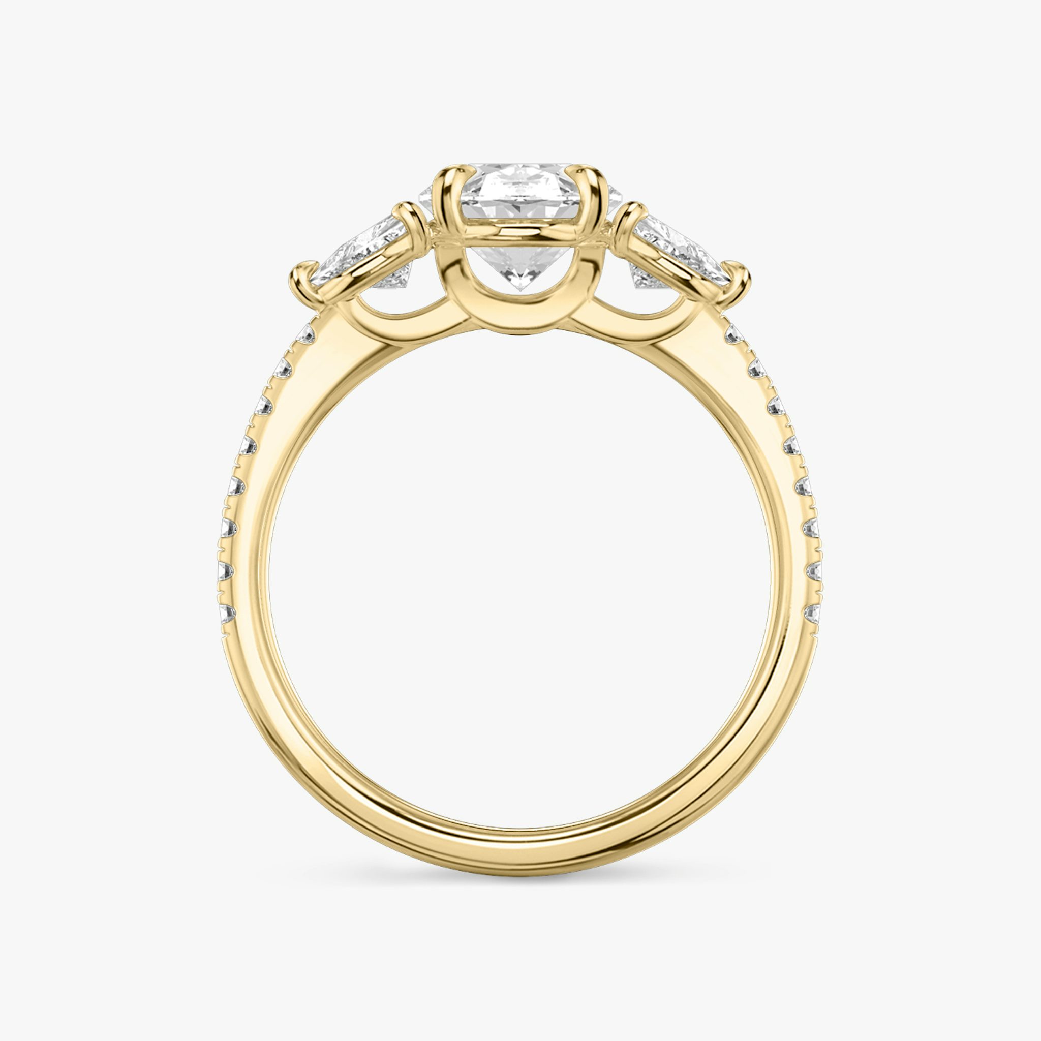 The Three Stone | Oval | 18k | Yellow Gold | bandAccent: Pavé | sideStoneCarat: 0.25ct | sideStoneShape: Trillion | diamondOrientation: vertical | caratWeight: other