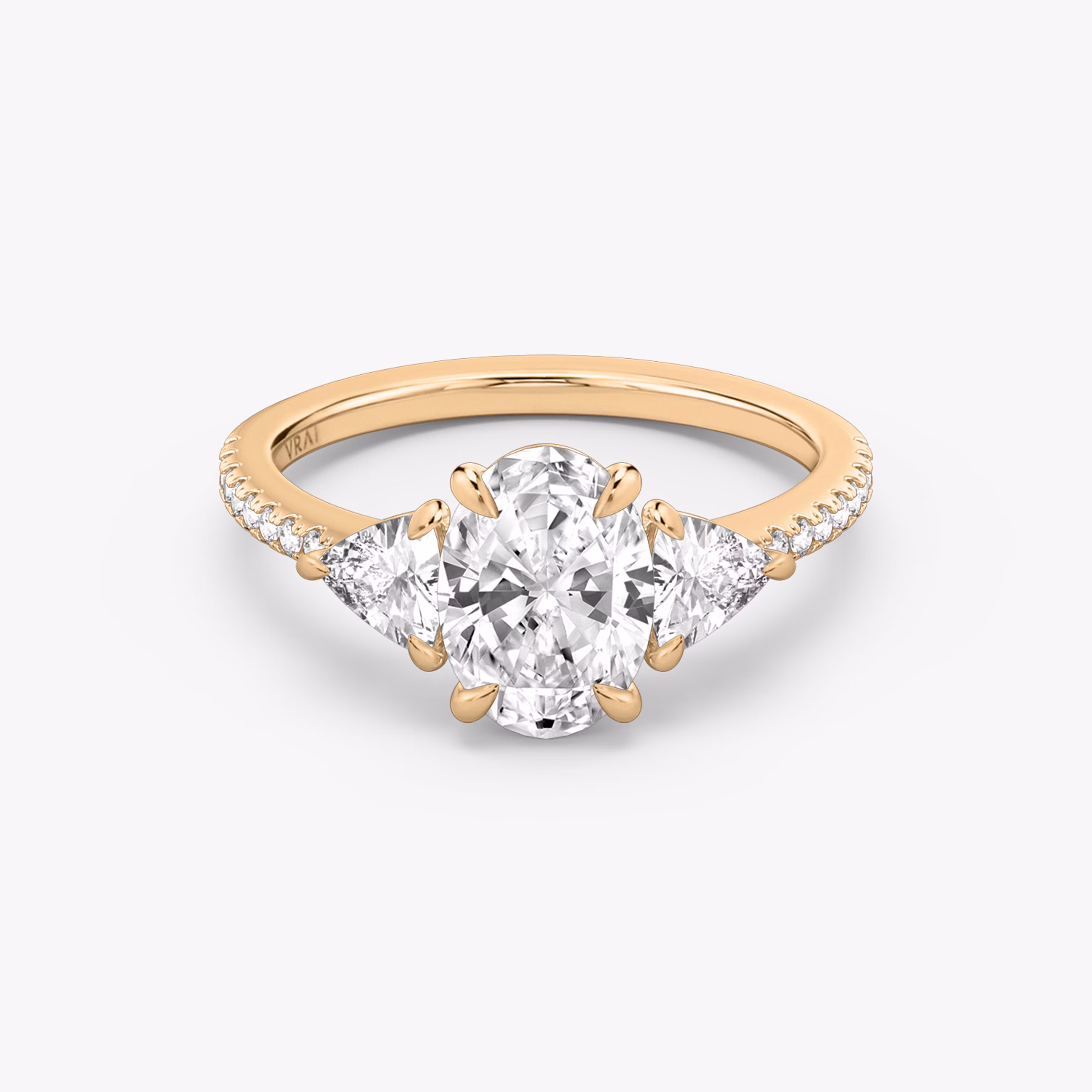 The Oval Three Stone with Trillion Side Stones