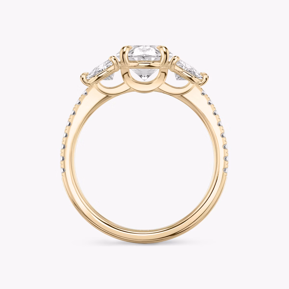 The Three Stone | Oval | 14k | Rose Gold | bandAccent: Pavé | sideStoneCarat: 0.25ct | sideStoneShape: Trillion | diamondOrientation: vertical | caratWeight: other