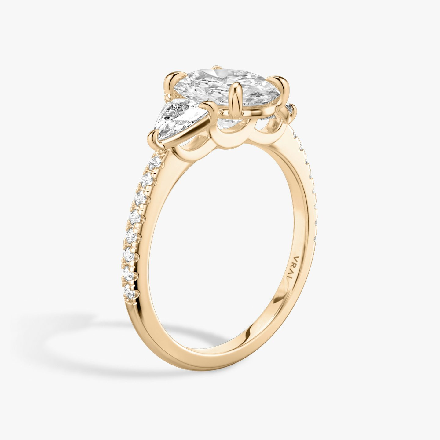 The Three Stone | Oval | 14k | Rose Gold | bandAccent: Pavé | sideStoneCarat: 0.25ct | sideStoneShape: Trillion | diamondOrientation: vertical | caratWeight: other