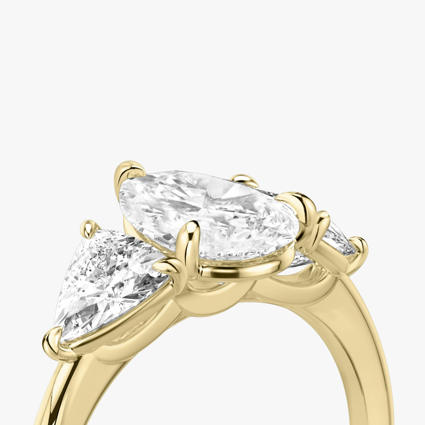 The Three Stone | Pear | 18k | Yellow Gold | bandAccent: Plain | sideStoneCarat: 0.50ct | sideStoneShape: Trillion | diamondOrientation: vertical | caratWeight: other