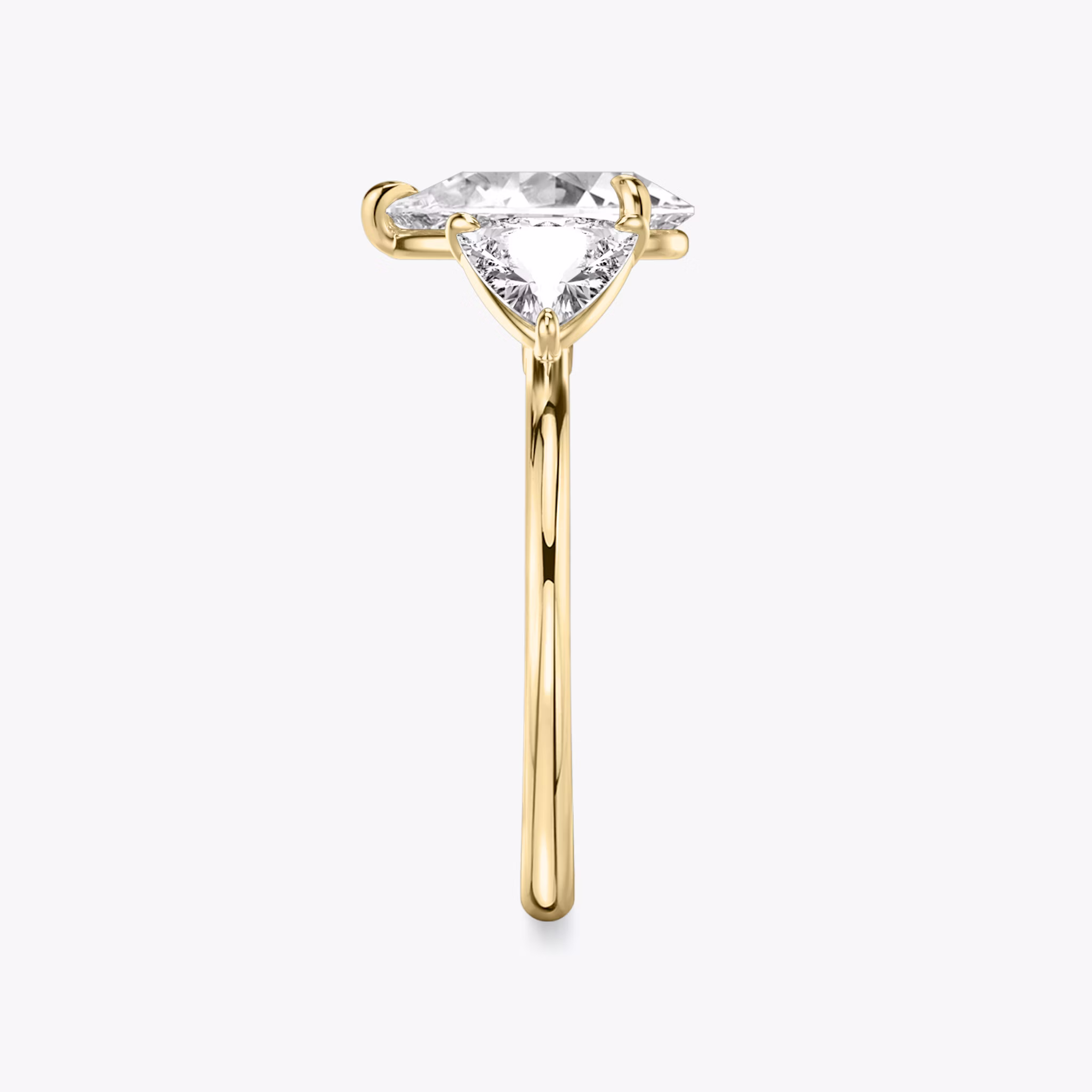 The Three Stone | Pear | 18k | Yellow Gold | bandAccent: Plain | sideStoneCarat: 0.50ct | sideStoneShape: Trillion | diamondOrientation: vertical | caratWeight: other