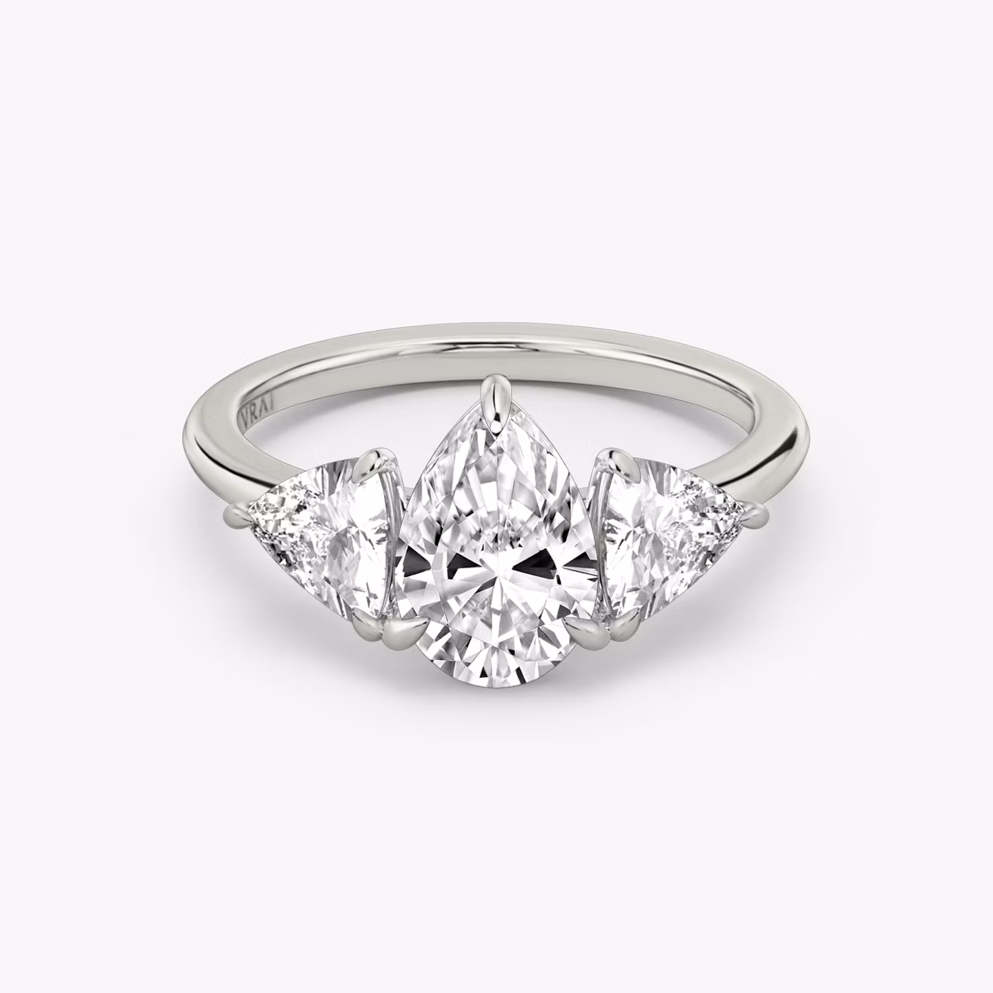 The Three Stone Pear | Platinum