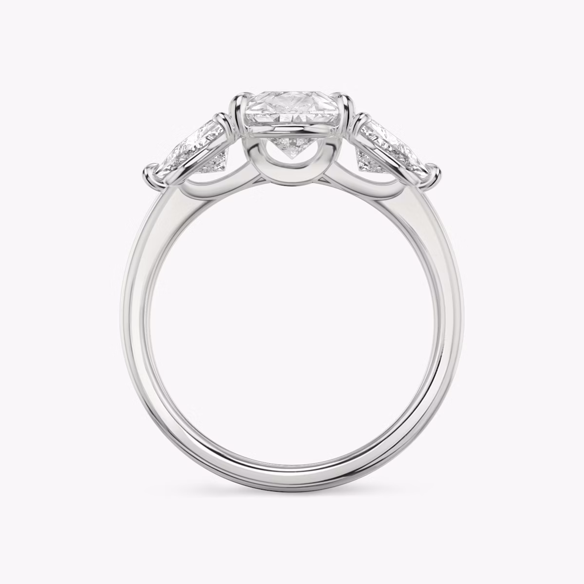 The Three Stone | Pear | Platinum | bandAccent: Plain | sideStoneCarat: 0.50ct | sideStoneShape: Trillion | diamondOrientation: vertical | caratWeight: other