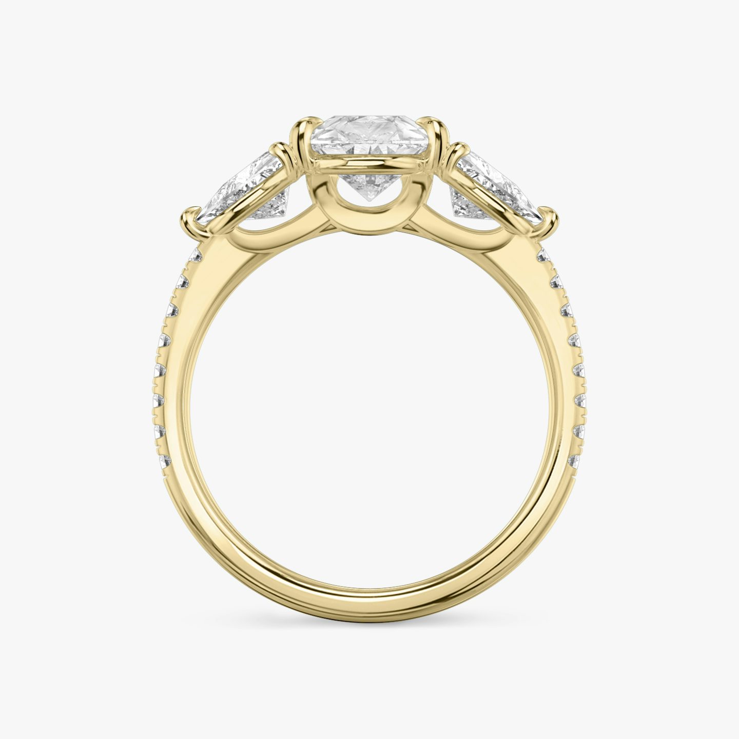 The Three Stone | Pear | 18k | Yellow Gold | bandAccent: Pavé | sideStoneCarat: 0.50ct | sideStoneShape: Trillion | diamondOrientation: vertical | caratWeight: other