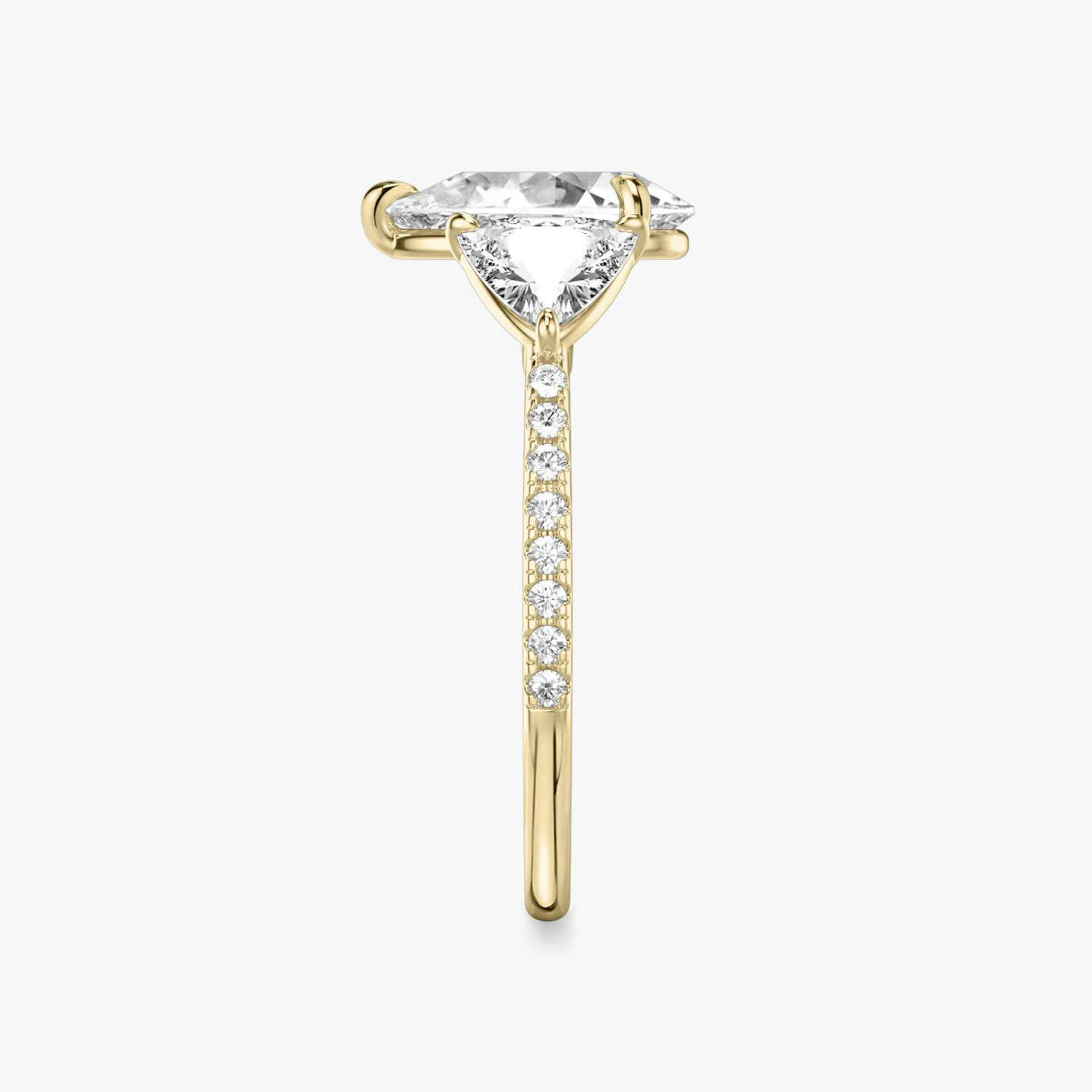 The Three Stone | Pear | 18k | Yellow Gold | bandAccent: Pavé | sideStoneCarat: 0.50ct | sideStoneShape: Trillion | diamondOrientation: vertical | caratWeight: other