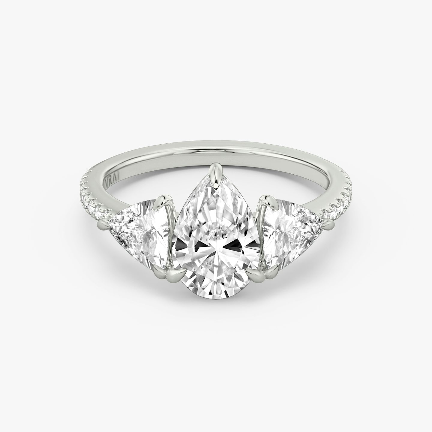 The Three Stone | Pear | 18k | White Gold | bandAccent: Pavé | sideStoneCarat: 0.50ct | sideStoneShape: Trillion | diamondOrientation: vertical | caratWeight: other