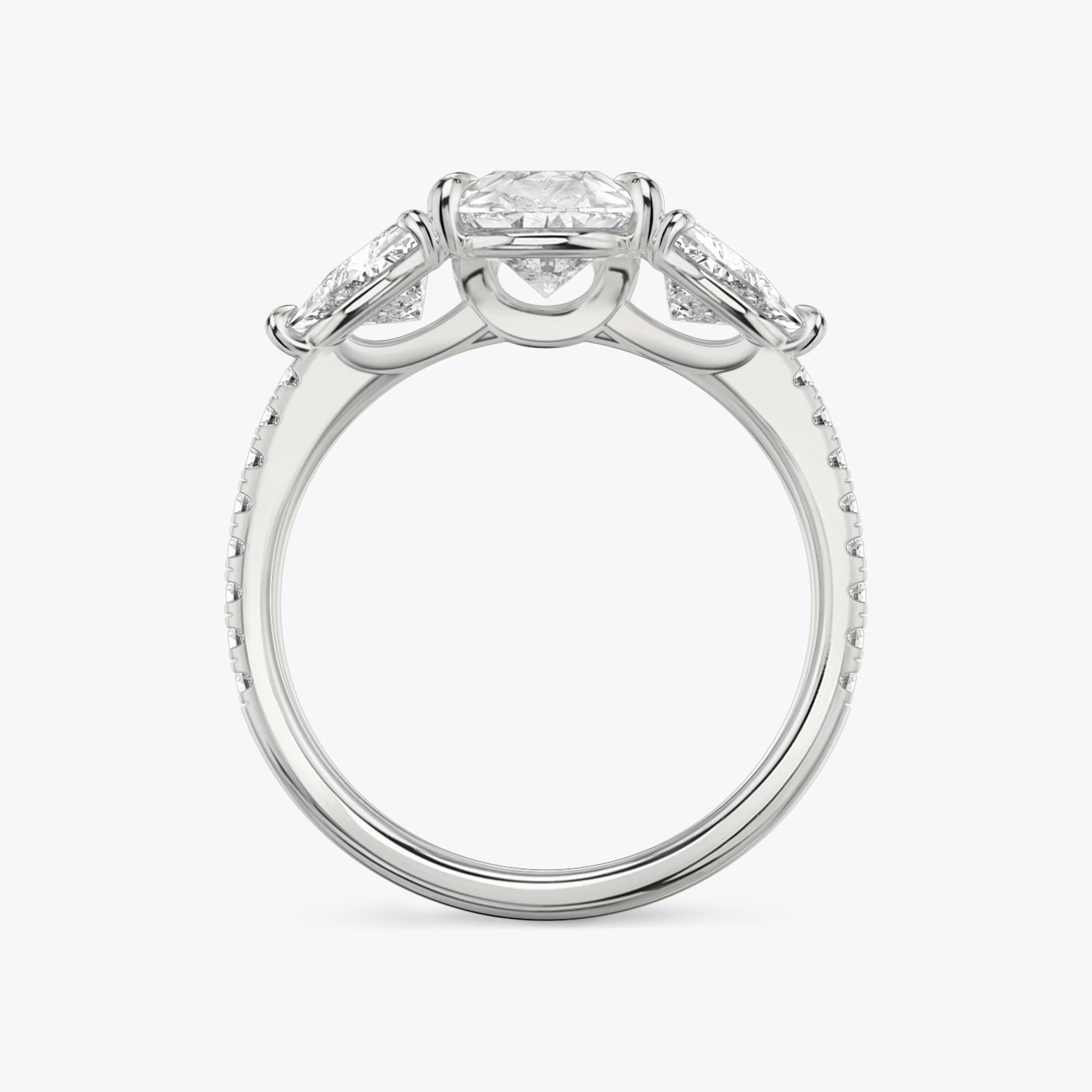 The Three Stone | Pear | 18k | White Gold | bandAccent: Pavé | sideStoneCarat: 0.50ct | sideStoneShape: Trillion | diamondOrientation: vertical | caratWeight: other