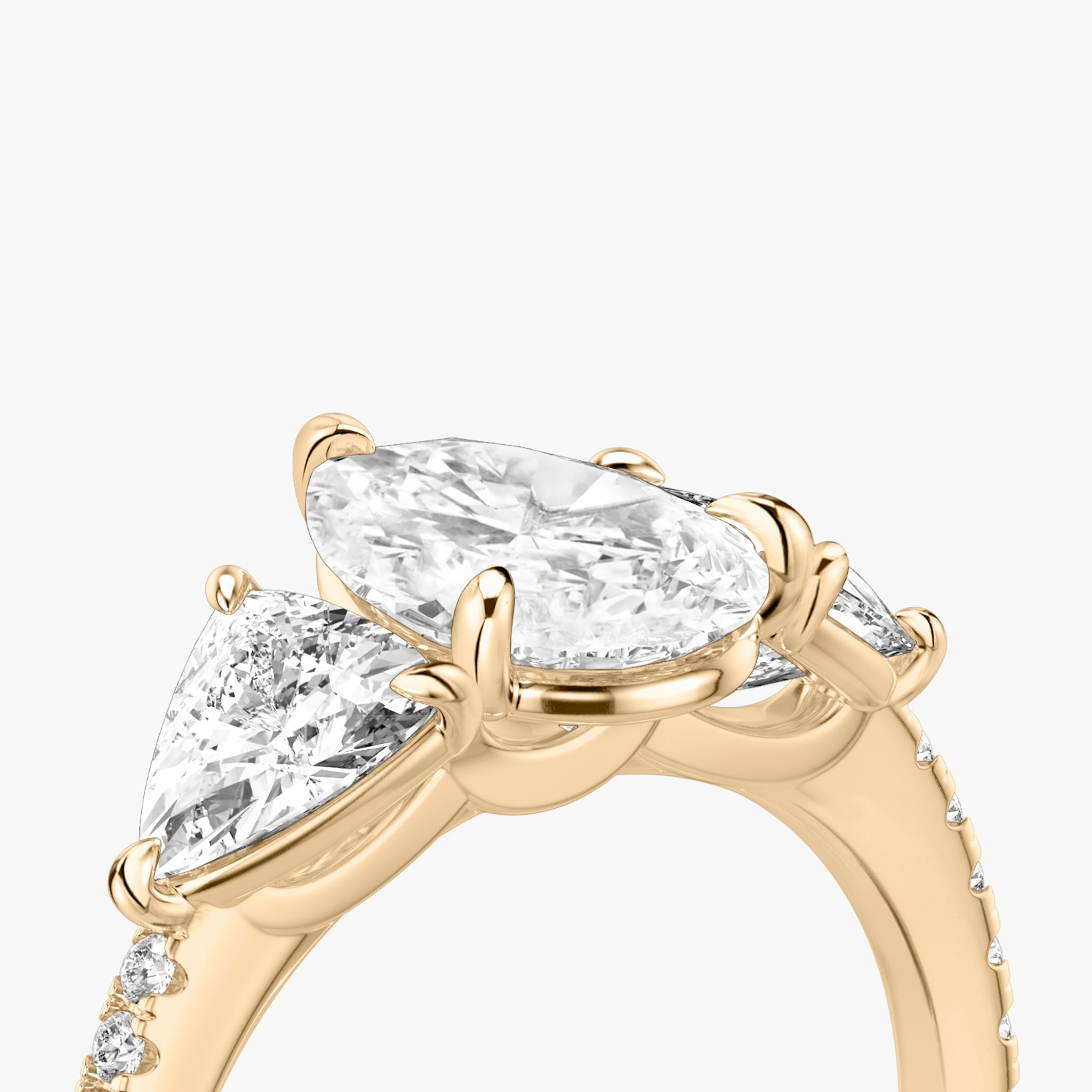 The Three Stone | Pear | 14k | Rose Gold | bandAccent: Pavé | sideStoneCarat: 0.50ct | sideStoneShape: Trillion | diamondOrientation: vertical | caratWeight: other