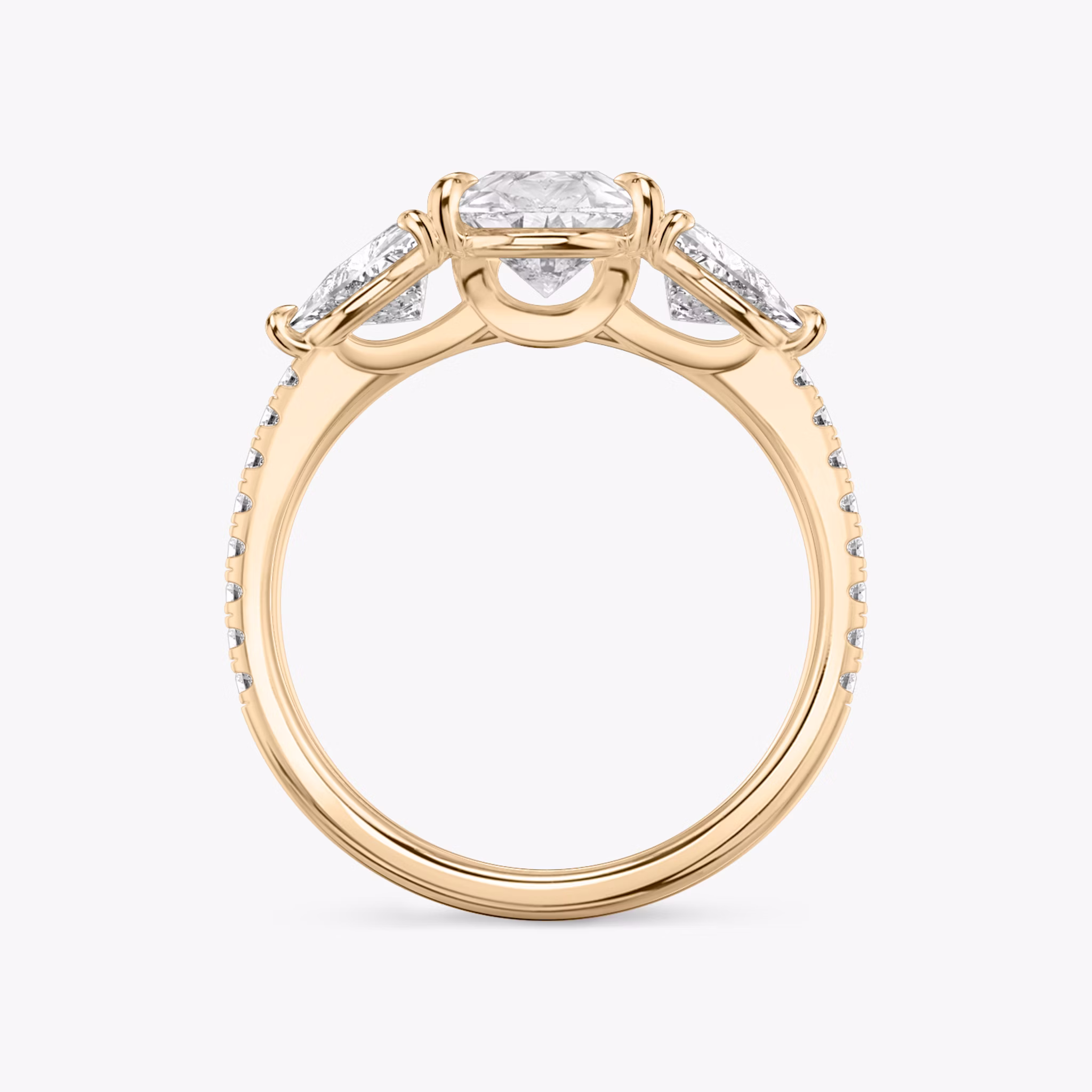 The Three Stone | Pear | 14k | Rose Gold | bandAccent: Pavé | sideStoneCarat: 0.50ct | sideStoneShape: Trillion | diamondOrientation: vertical | caratWeight: other