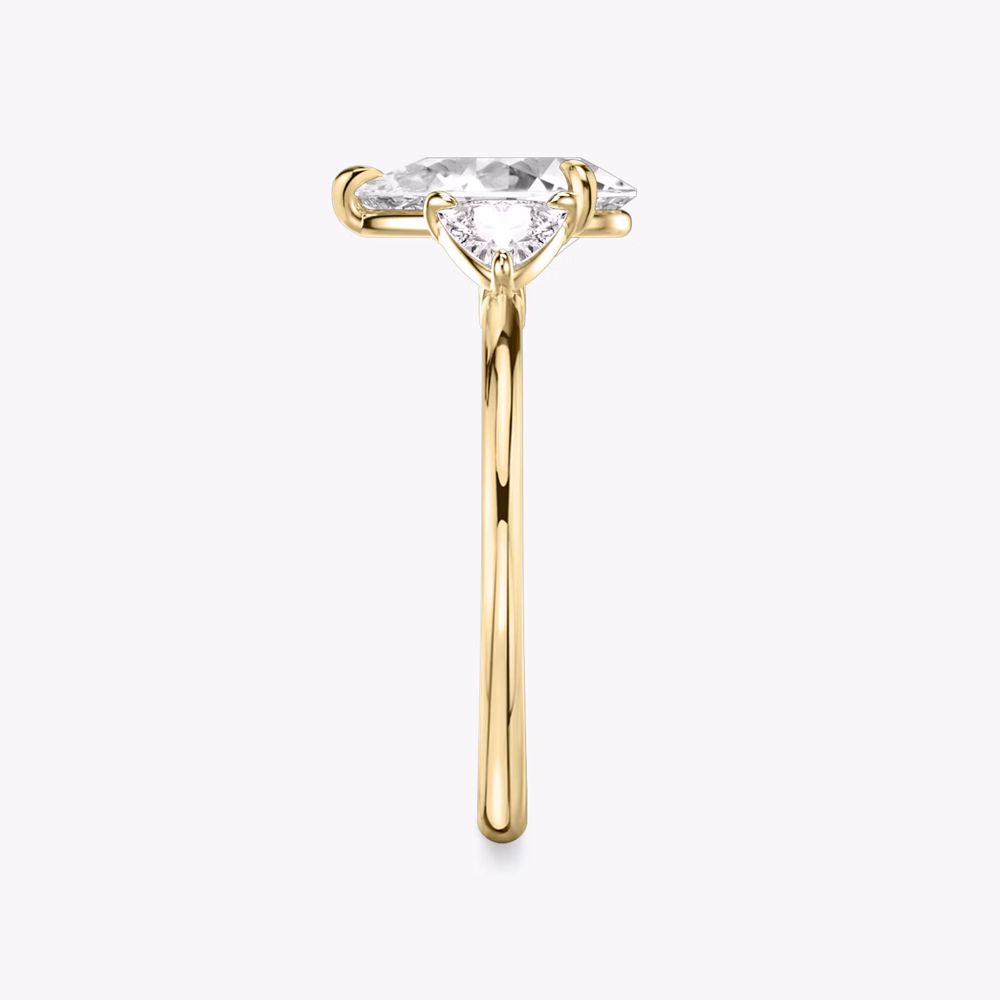 The Three Stone | Pear | 18k | Yellow Gold | bandAccent: Plain | sideStoneCarat: 0.25ct | sideStoneShape: Trillion | diamondOrientation: vertical | caratWeight: other