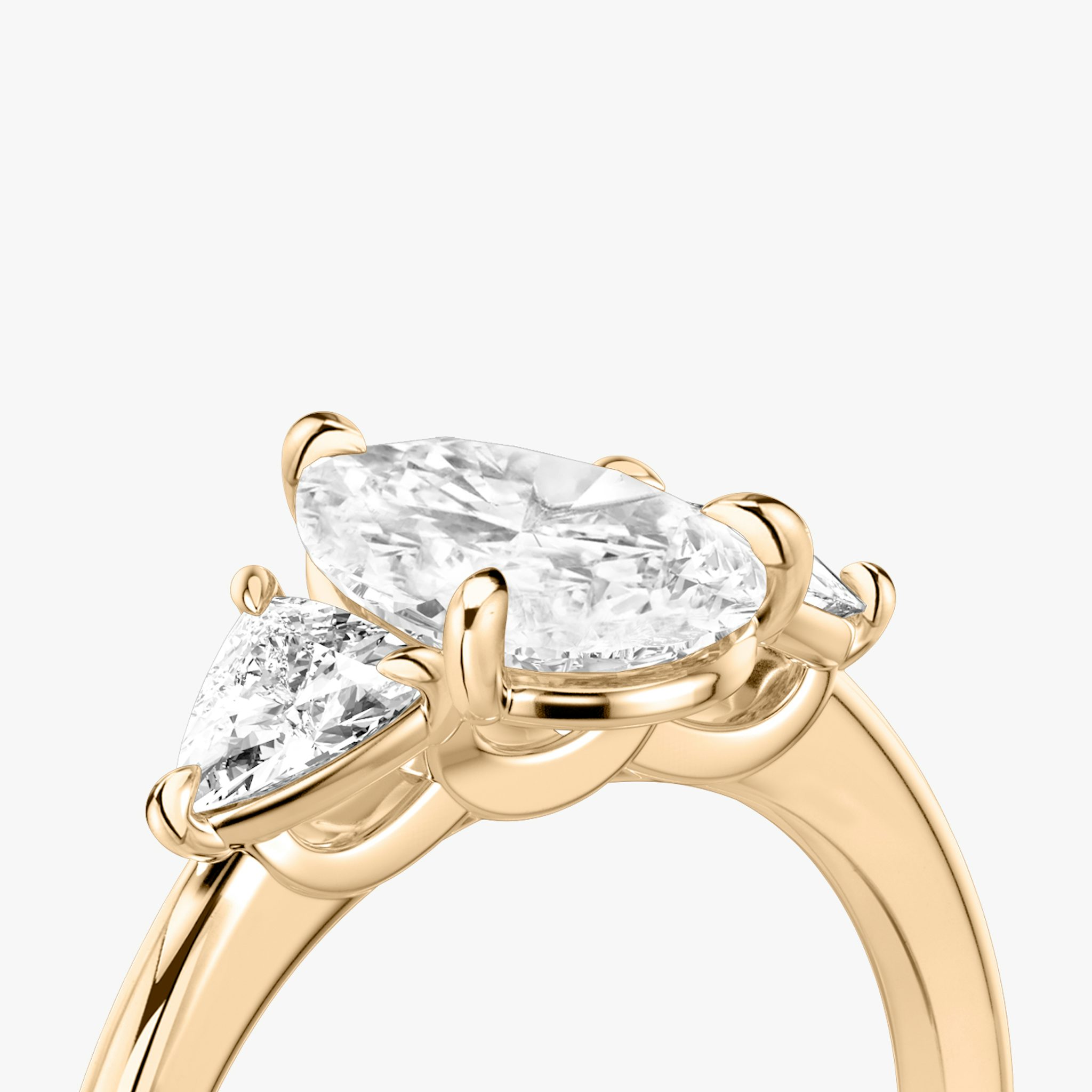The Three Stone | Pear | 14k | Rose Gold | bandAccent: Plain | sideStoneCarat: 0.25ct | sideStoneShape: Trillion | diamondOrientation: vertical | caratWeight: other