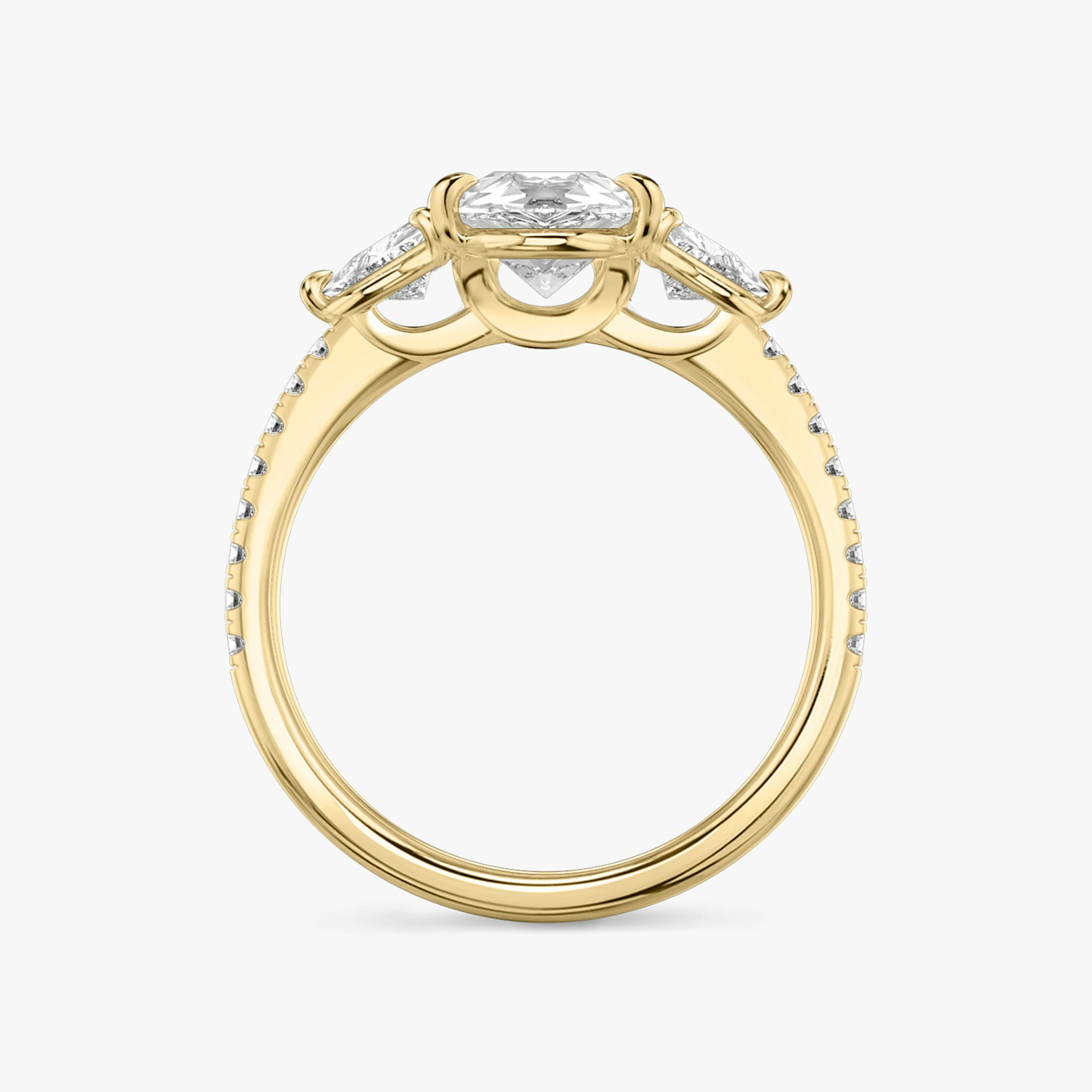 The Three Stone | Pear | 18k | Yellow Gold | bandAccent: Pavé | sideStoneCarat: 0.25ct | sideStoneShape: Trillion | diamondOrientation: vertical | caratWeight: other