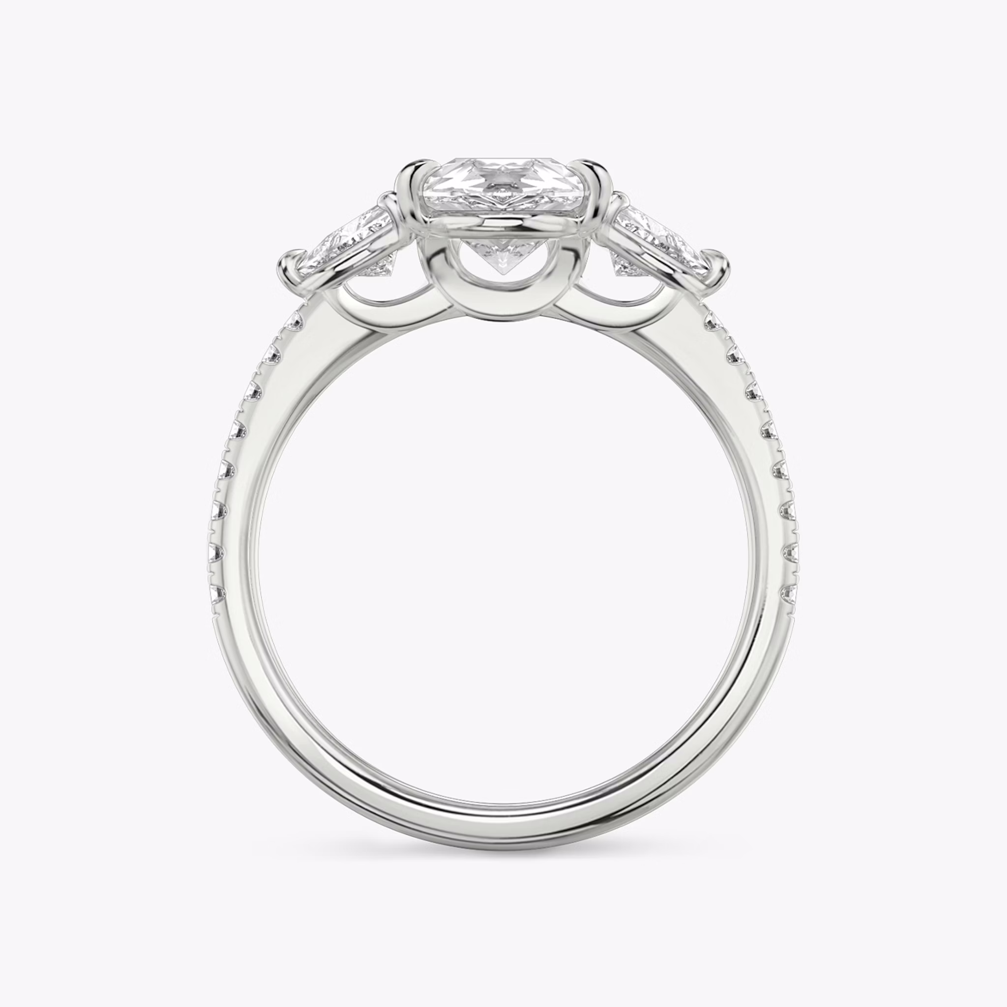The Three Stone | Pear | 18k | White Gold | bandAccent: Pavé | sideStoneCarat: 0.25ct | sideStoneShape: Trillion | diamondOrientation: vertical | caratWeight: other