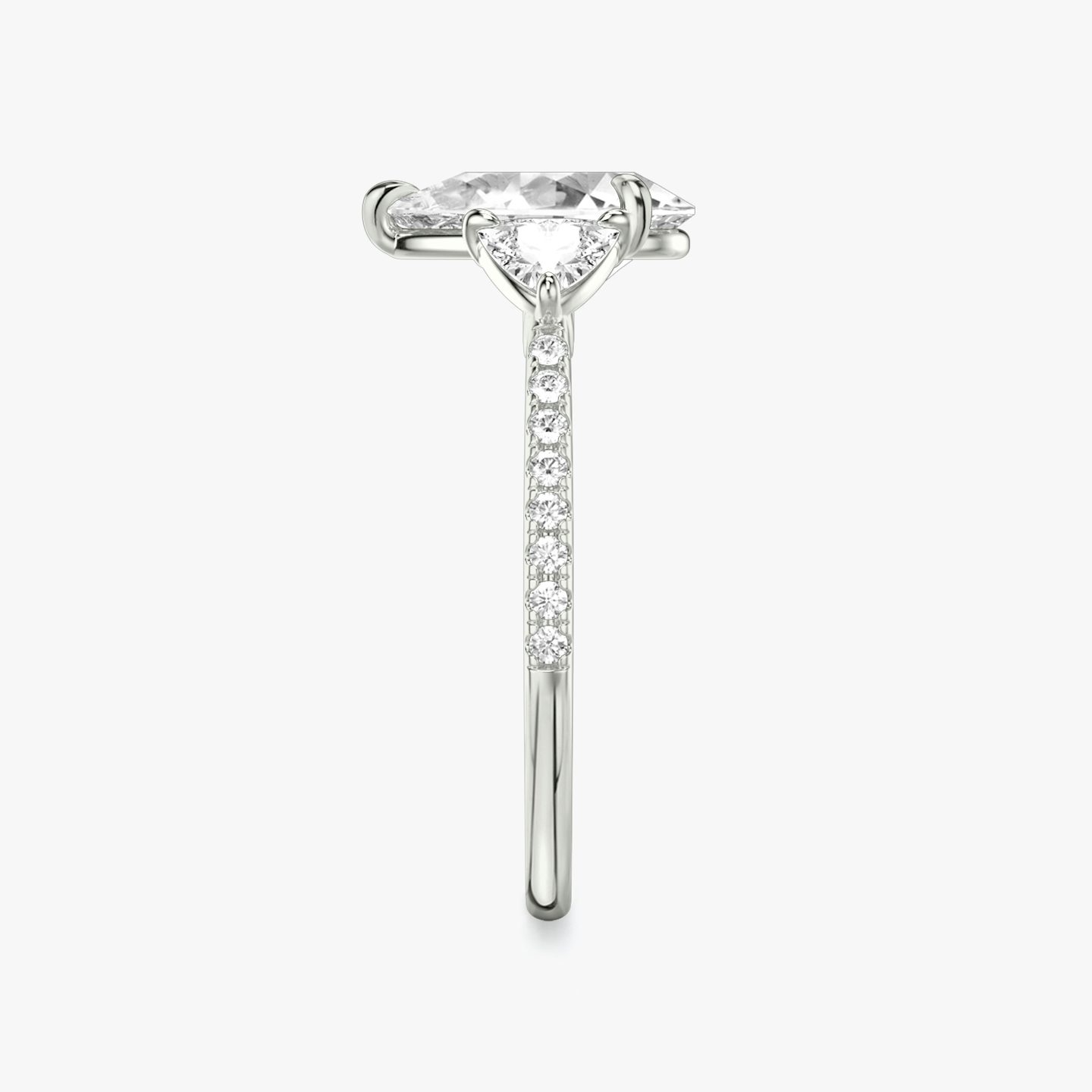 The Three Stone | Pear | 18k | White Gold | bandAccent: Pavé | sideStoneCarat: 0.25ct | sideStoneShape: Trillion | diamondOrientation: vertical | caratWeight: other