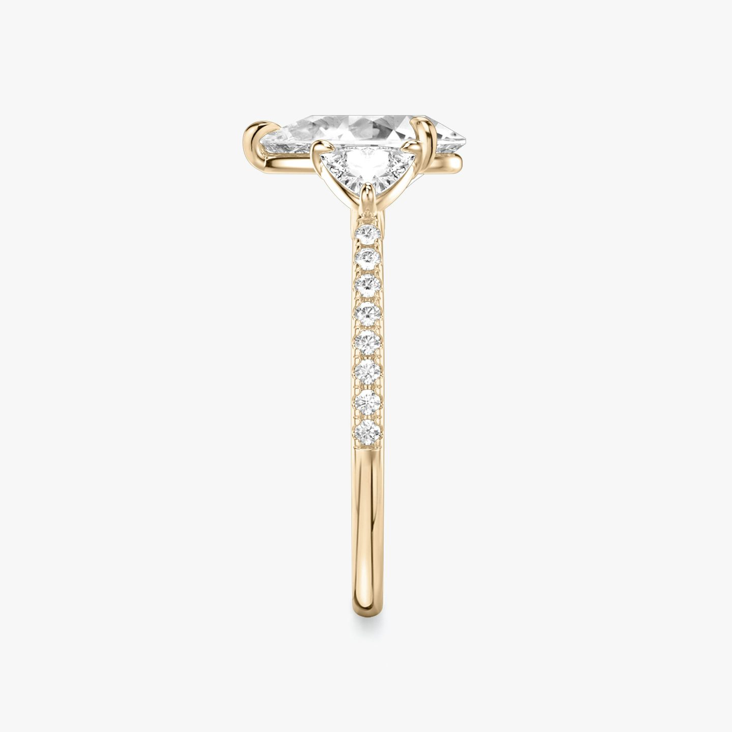 The Three Stone | Pear | 14k | Rose Gold | bandAccent: Pavé | sideStoneCarat: 0.25ct | sideStoneShape: Trillion | diamondOrientation: vertical | caratWeight: other
