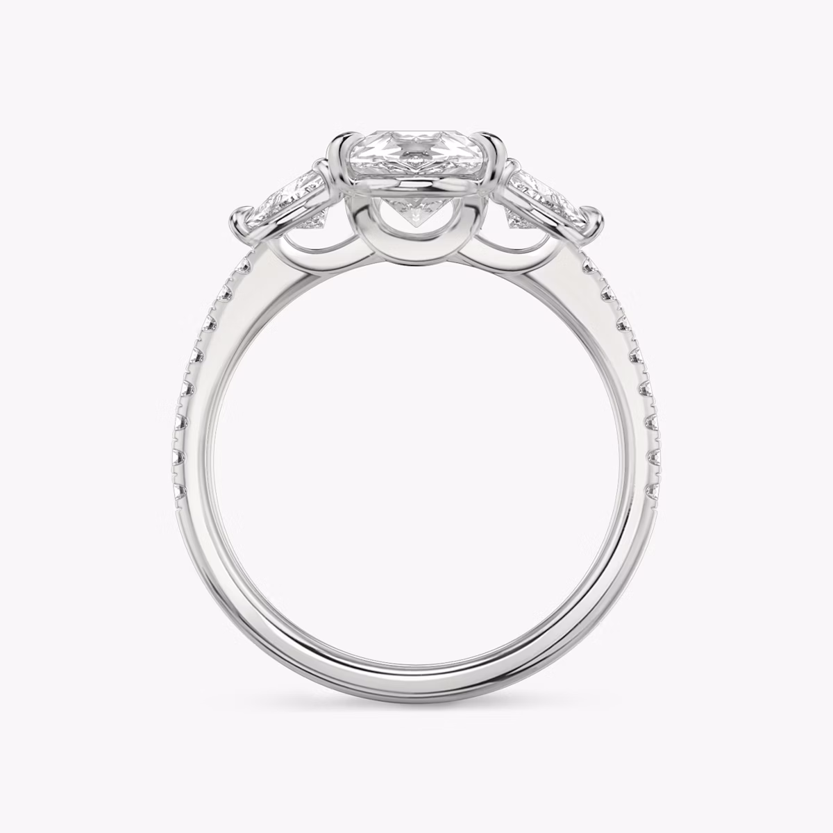 The Three Stone | Pear | Platinum | bandAccent: Pavé | sideStoneCarat: 0.25ct | sideStoneShape: Trillion | diamondOrientation: vertical | caratWeight: other