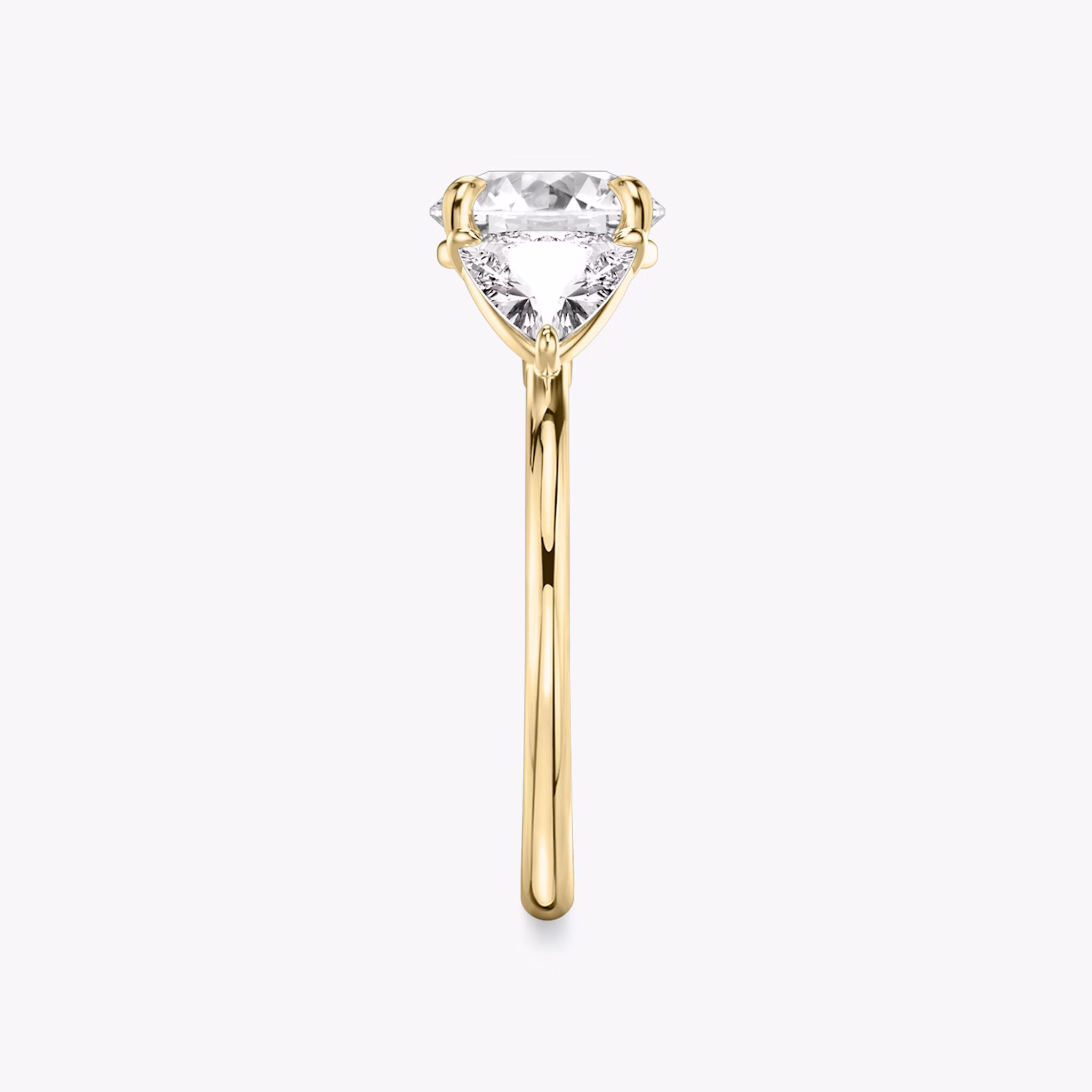 The Three Stone | Round Brilliant | 18k | Yellow Gold | bandAccent: Plain | caratWeight: other | sideStoneCarat: 0.50ct | sideStoneShape: Trillion | diamondOrientation: vertical