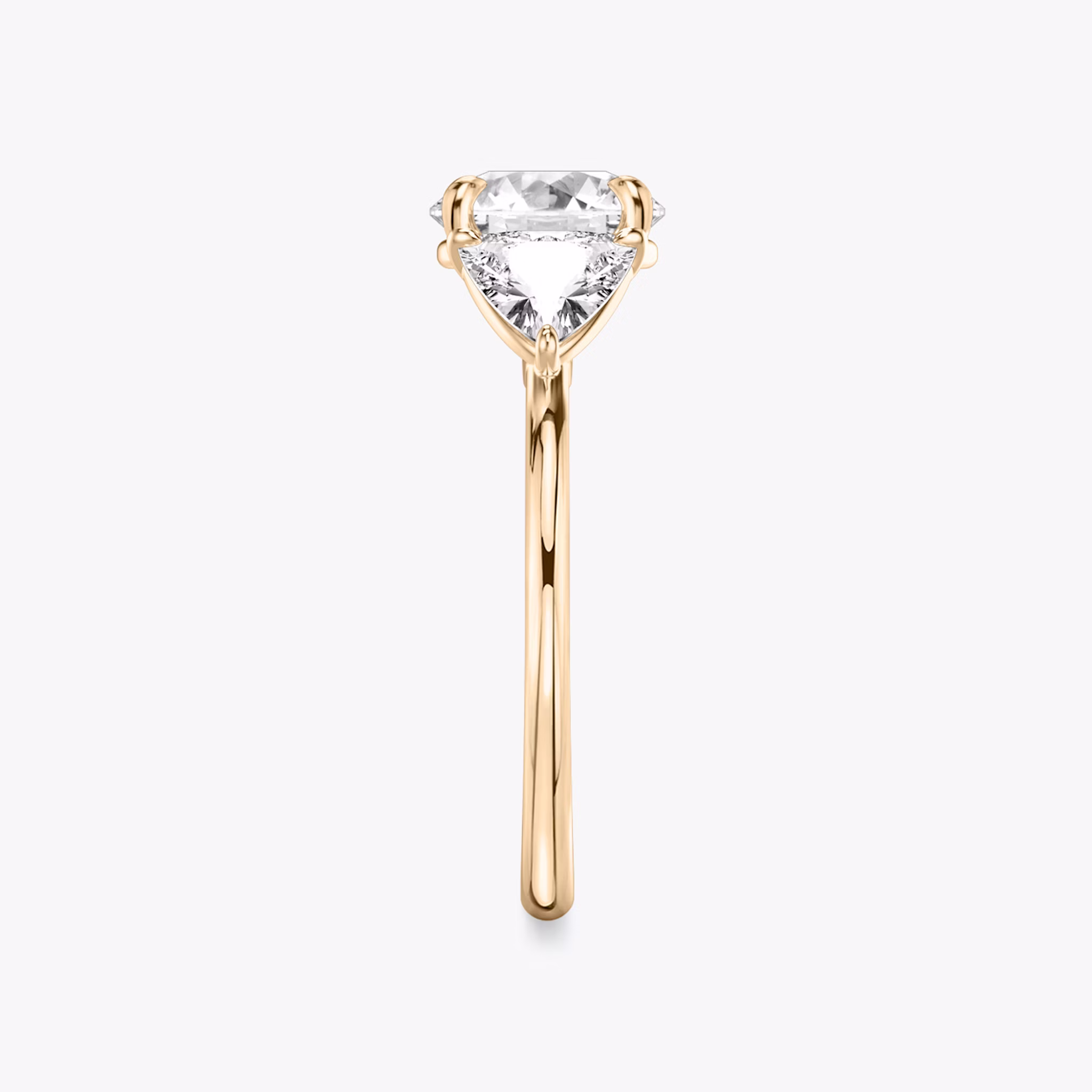 The Three Stone | Round Brilliant | 14k | Rose Gold | bandAccent: Plain | caratWeight: other | sideStoneCarat: 0.50ct | sideStoneShape: Trillion | diamondOrientation: vertical