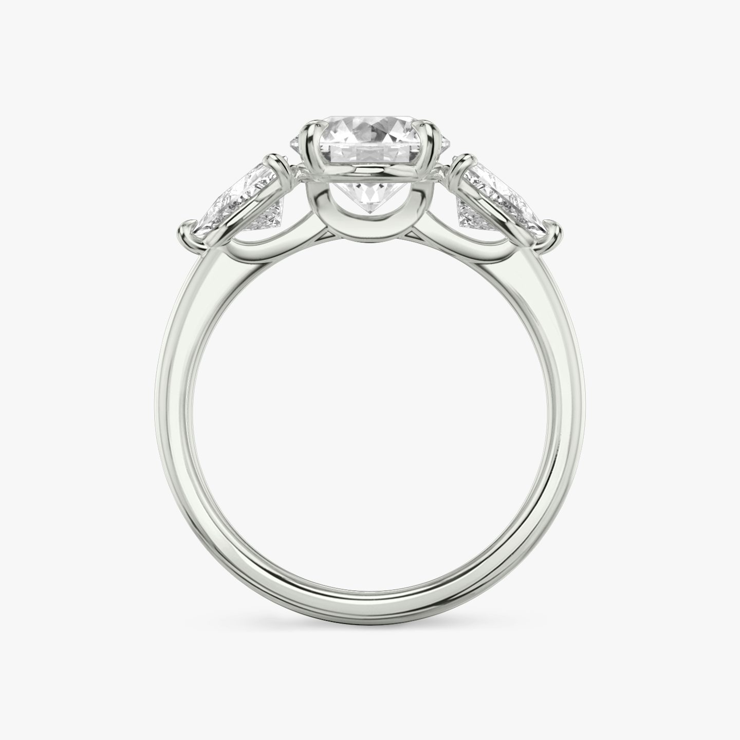 The Three Stone | Round Brilliant | Platinum | bandAccent: Plain | caratWeight: other | sideStoneCarat: 0.50ct | sideStoneShape: Trillion | diamondOrientation: vertical