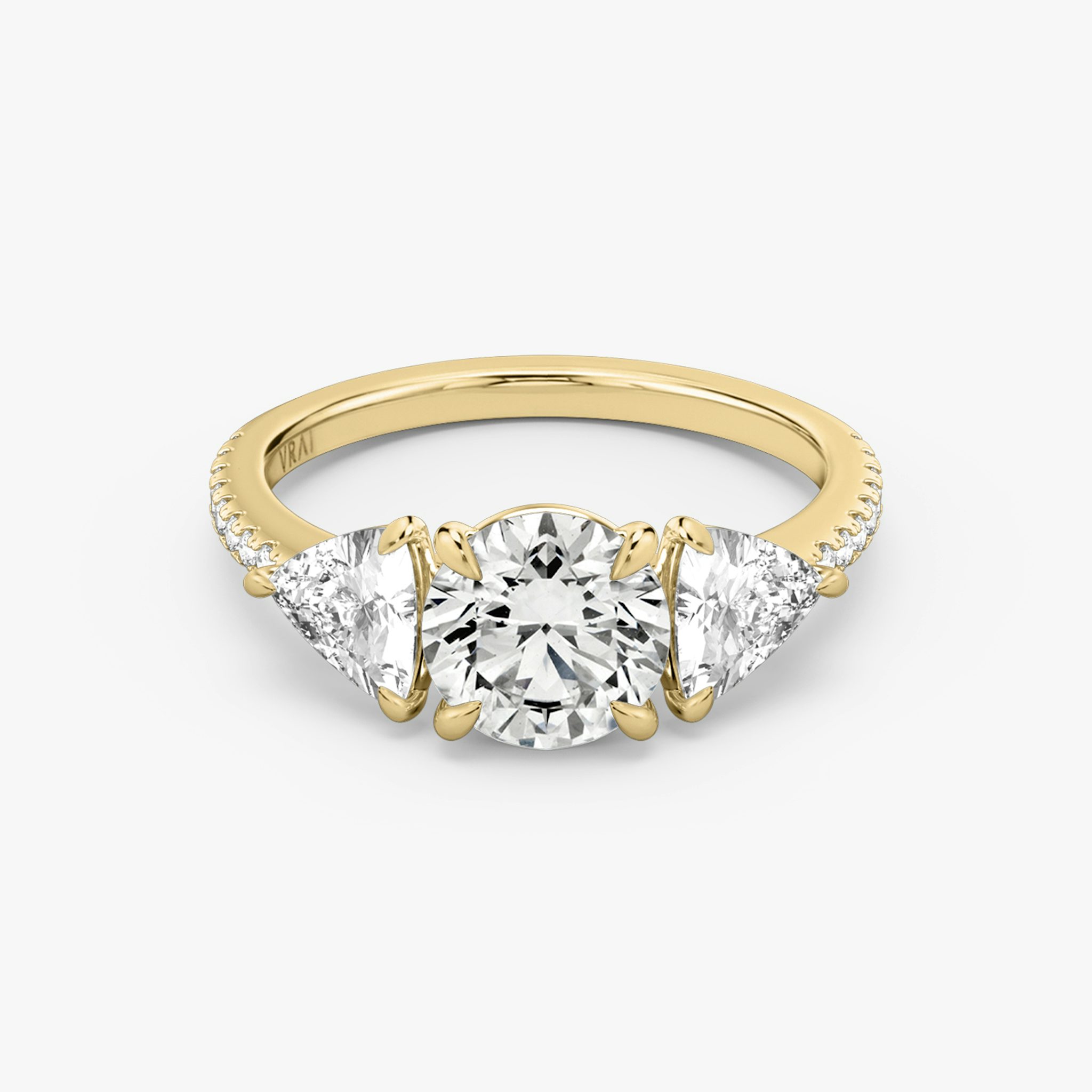 The Three Stone | Round Brilliant | 18k | Yellow Gold | bandAccent: Pavé | caratWeight: other | sideStoneCarat: 0.50ct | sideStoneShape: Trillion | diamondOrientation: vertical